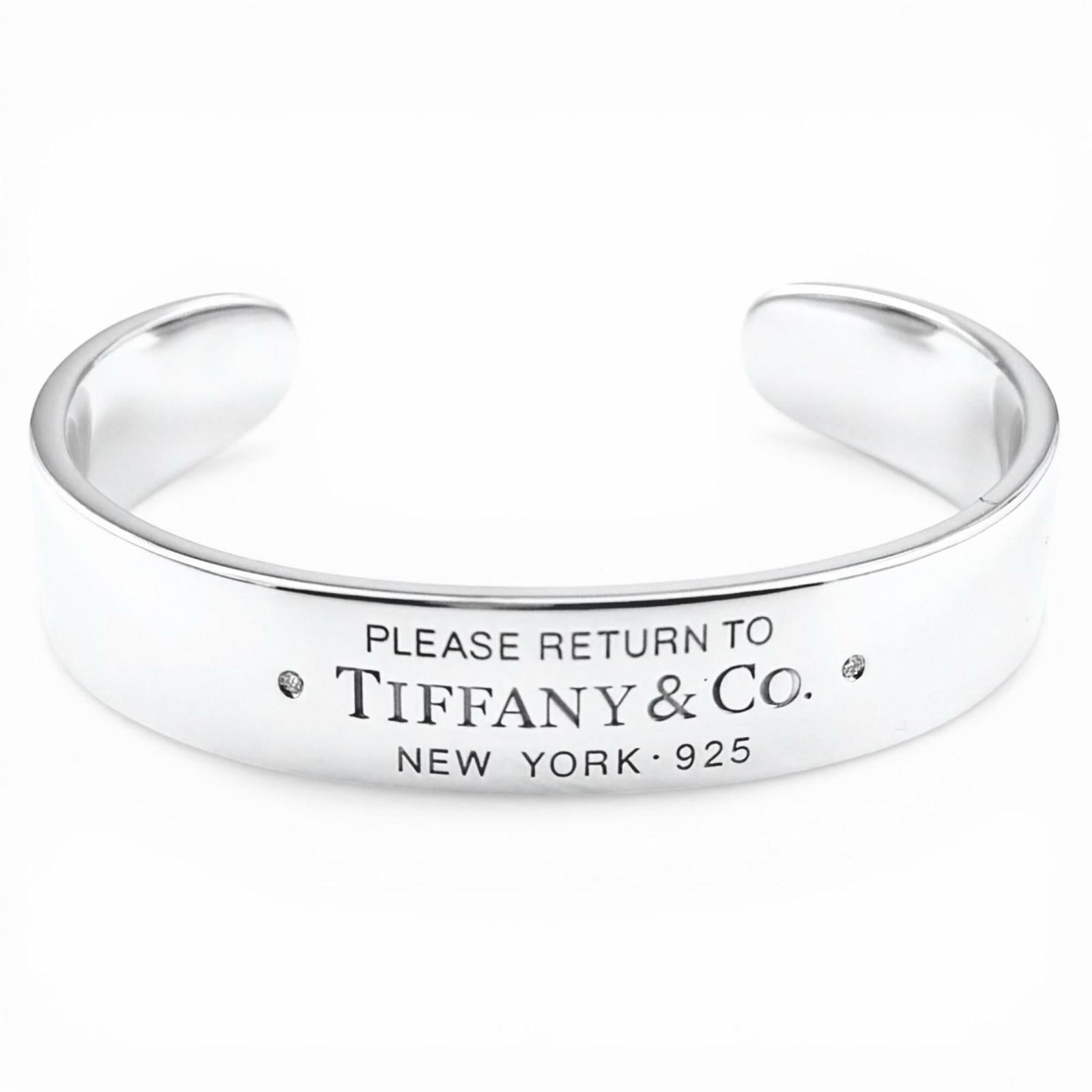 TIFFANY Bangle Silver 925: TIFFANY Bangle Silver 925 Silver 925 bangle from Tiffany's Return To Tiffany line, featuring a sleek and modern design with a width of 12cm. In excellent condition, this bangle shows only the faintest