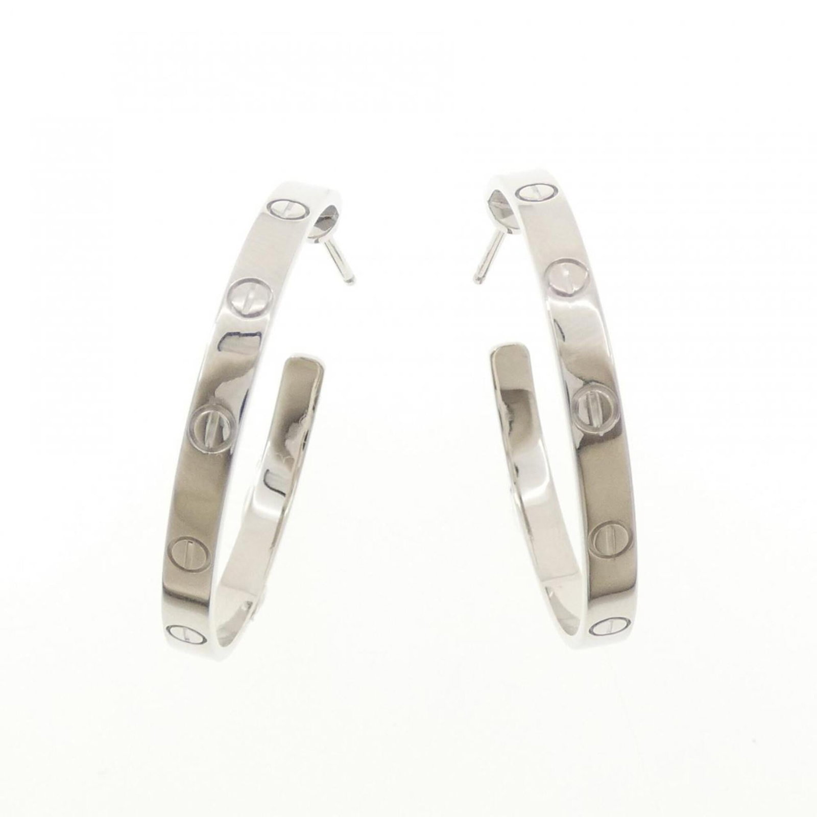 CARTIER Hoop Earrings White Gold (18K): CARTIER Hoop Earrings White Gold (18K) White gold (18K) hoop earrings from Cartier, featuring a sleek and timeless design. Made from high-quality 18K white gold, these earrings boast a classic