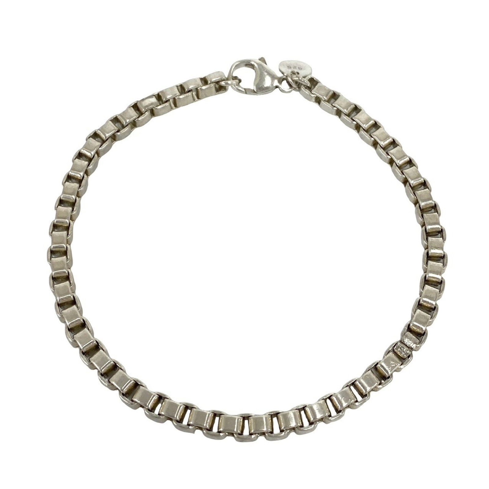 TIFFANY Charm Bracelet Silver 925: TIFFANY Charm Bracelet Silver 925 Silver 925 Tiffany charm bracelet with visible scratches and scuffs, offering a unique, pre-owned charm bracelet with a silver finish. The bracelet measures 19cm in l