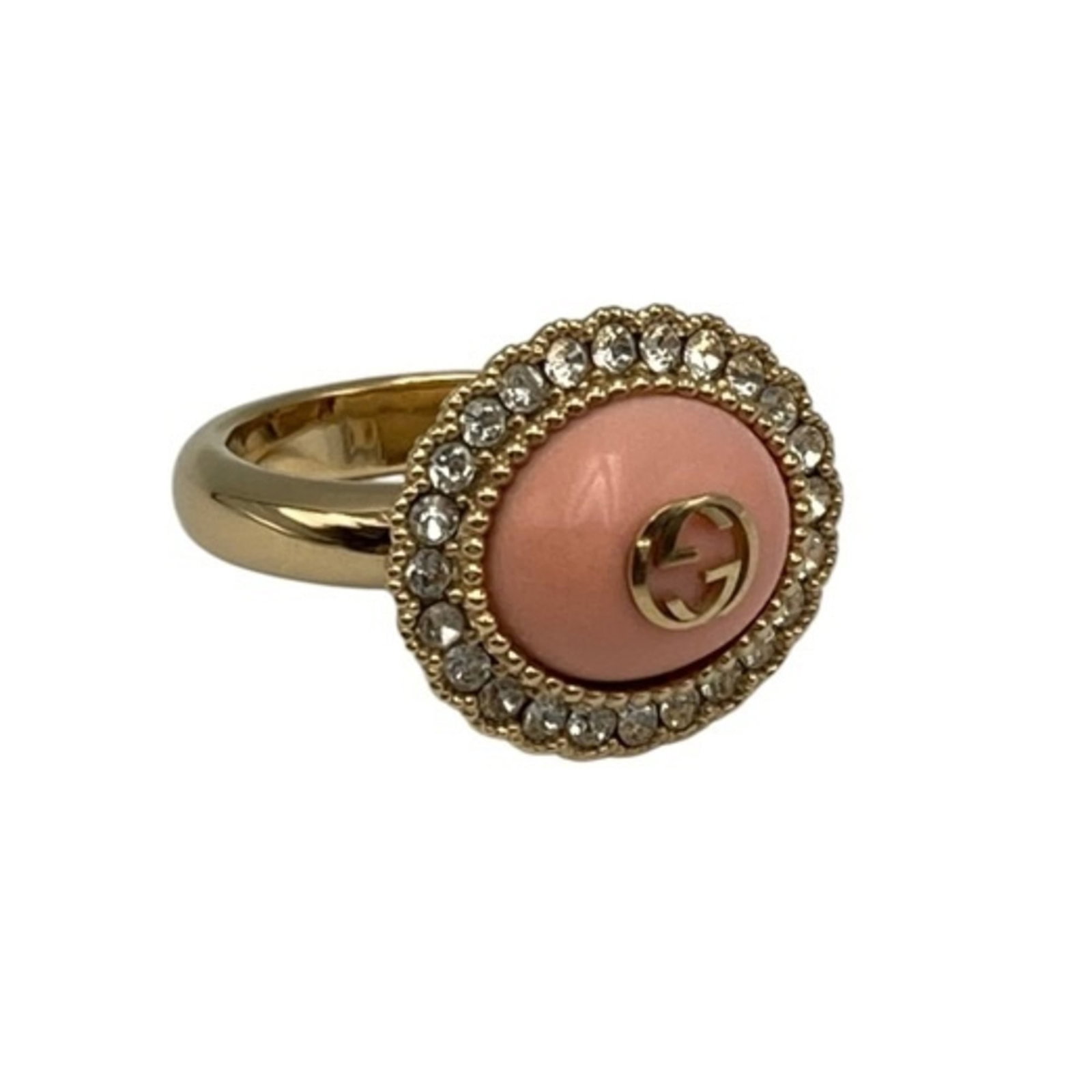 GUCCI Band Ring Metal: GUCCI Band Ring Metal Pink metal band ring from Gucci, featuring a rhinestone stone, with minor signs of wear and small scratches. This gently used ring is in very good condition, bearing a