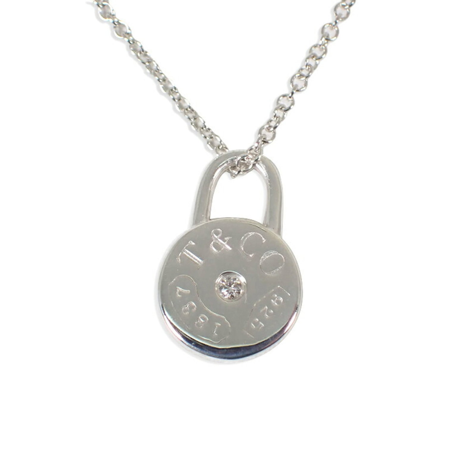 TIFFANY Sterling Silver 925: TIFFANY Sterling Silver 925 Sterling silver 925 necklace from Tiffany, featuring a diamond pendant, measures 42 cm in circumference and has a pendant size of 13.6mm x 9mm. The necklace is in very