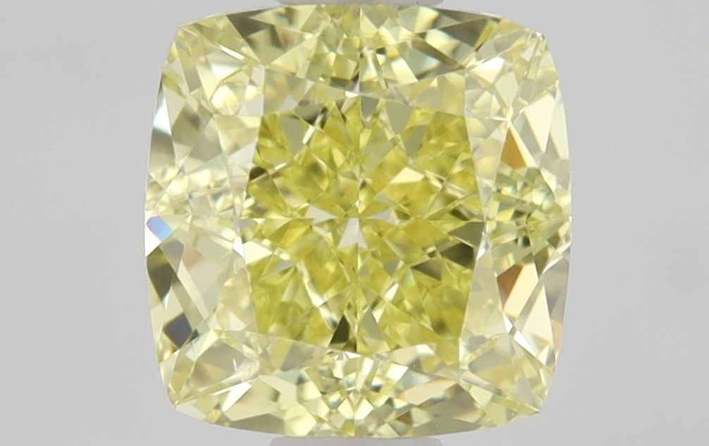 GIA Cushion Modified 1.01ct Fancy Yellow VVS2 - Loose Natural Diamond: GIA Cushion Modified 1.01ct Fancy Yellow VVS2 - Loose Natural Diamond GIA certified 1.01ct Fancy Yellow VVS2 diamond, boasting an EX polish and VG symmetry, is a standout in its natural beauty. This