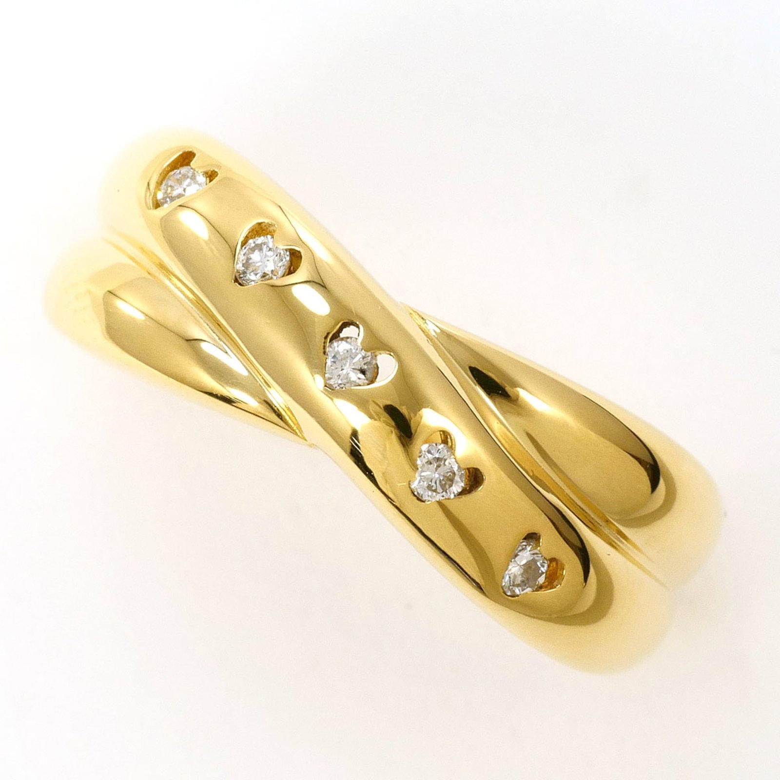 Band Ring Yellow Gold (18K): Band Ring Yellow Gold (18K) Yellow gold band ring with a 0.07ct diamond, crafted from 18K gold, offering a touch of elegance to any outfit. This like new used ring boasts a 7mm width and US size 5.5, 
