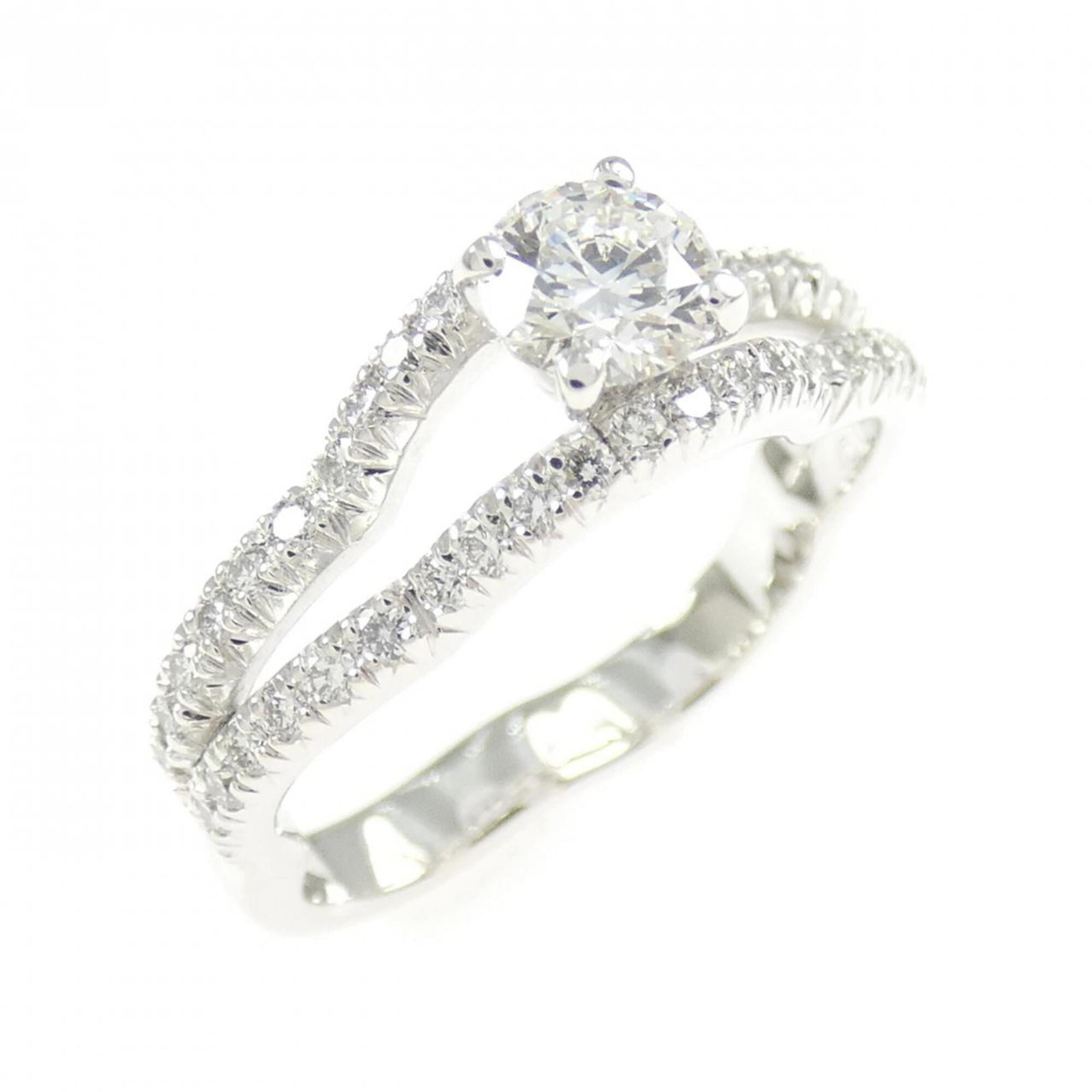 CHANEL Band Ring White Gold (18K): CHANEL Band Ring White Gold (18K) This 18K white gold band ring from CHANEL features a diamond stone and is made from high-quality white gold. In excellent condition, it shows only the faintest traces