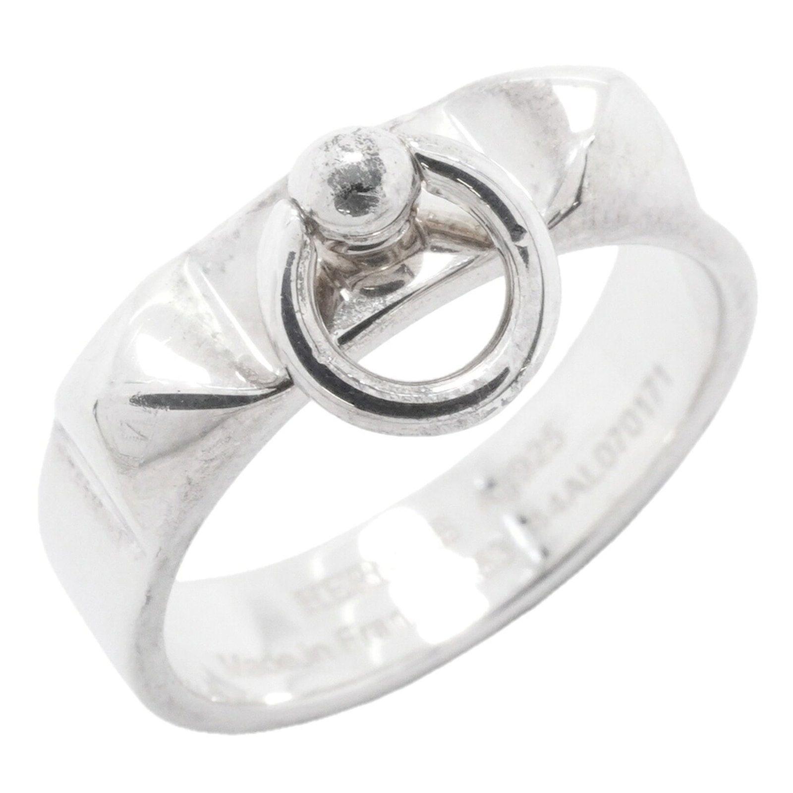 HERMES Band Ring Silver 925: HERMES Band Ring Silver 925 Silver 925 band ring from Hermes, featuring a classic design with visible scratches and scuffs. The ring is in good used condition, bearing a signature, and is made from