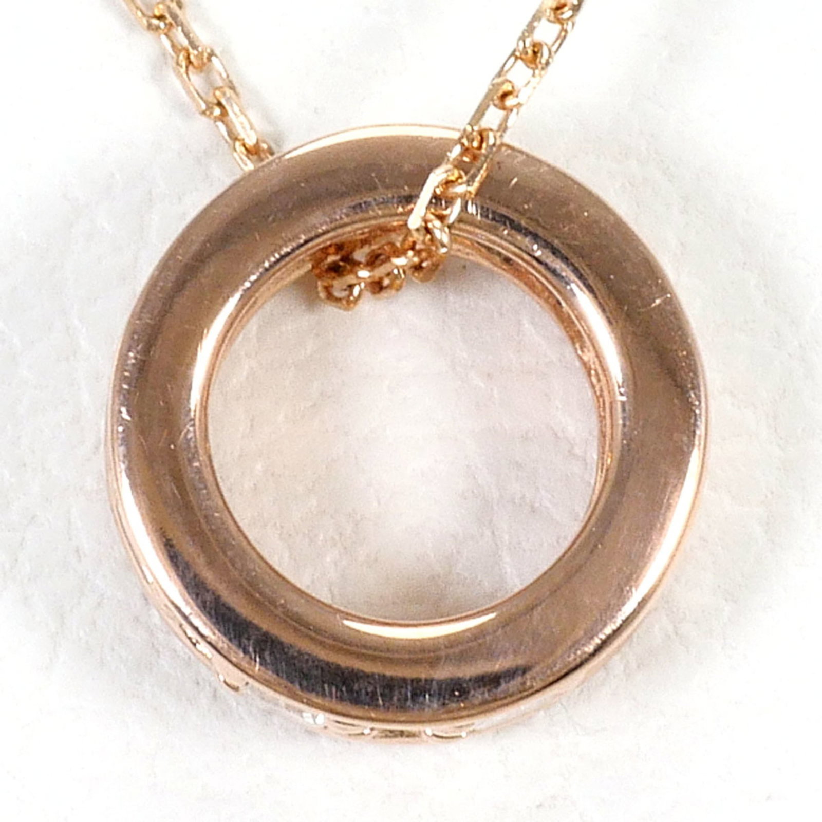 Pink Gold (10K): Pink Gold (10K) Pink gold (10K) necklace with a 0.10ct diamond pendant, measuring 6mm x 3mm. The necklace features a 46cm length with a 0.8g weight, and is made from 10K pink gold metal. In excellent