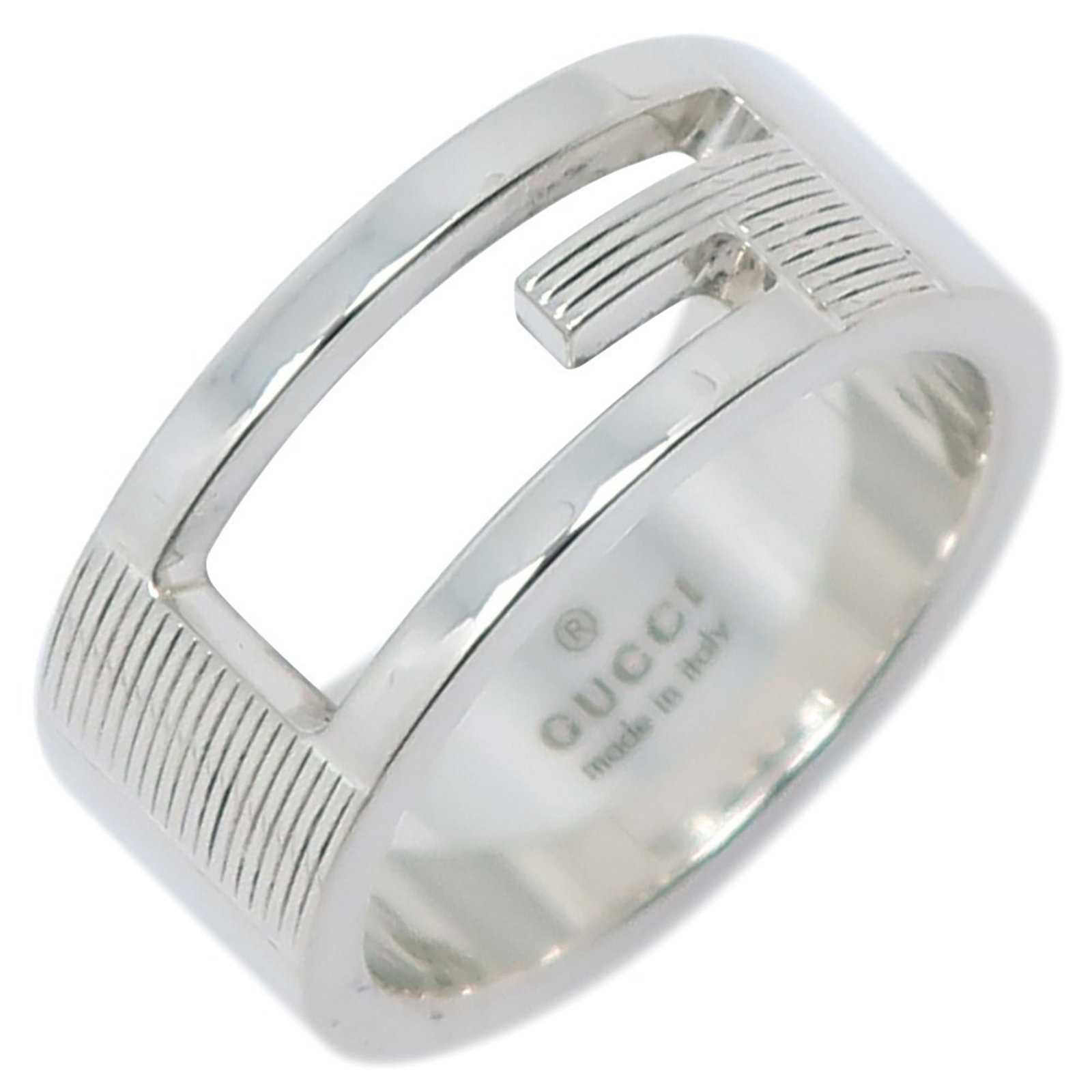 GUCCI Band Ring Silver 925: GUCCI Band Ring Silver 925 Silver 925 Gucci Band Ring - A Timeless Accessory. This gently used Gucci band ring features a sleek silver 925 design with a subtle width of 8mm, making it a versatile addi