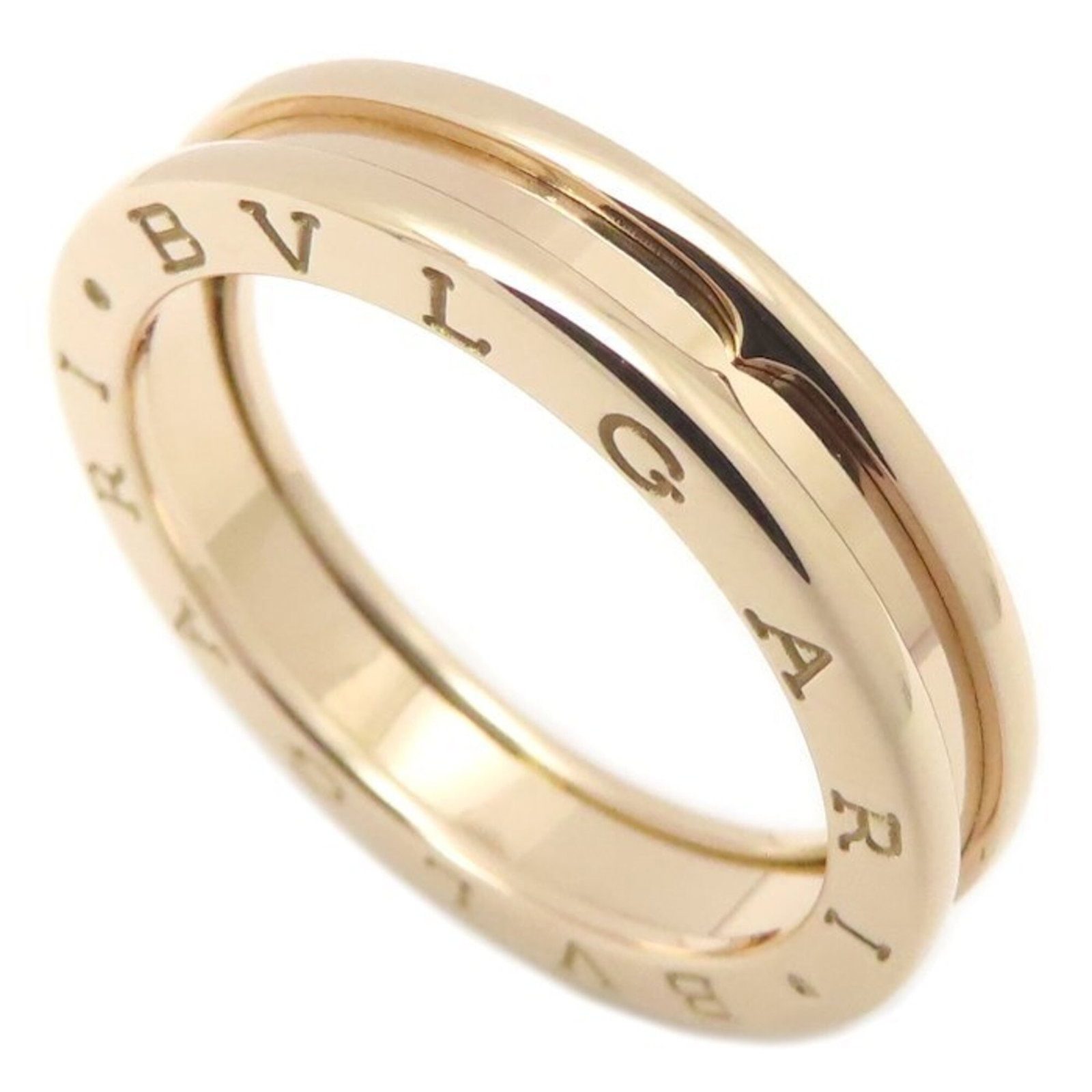 BVLGARI Band Ring Pink Gold (18K): BVLGARI Band Ring Pink Gold (18K) Pink gold (18K) BVLGARI Band Ring in excellent condition, featuring a subtle pink hue, and bearing a faint signature. This like-new used band ring is a stylish
