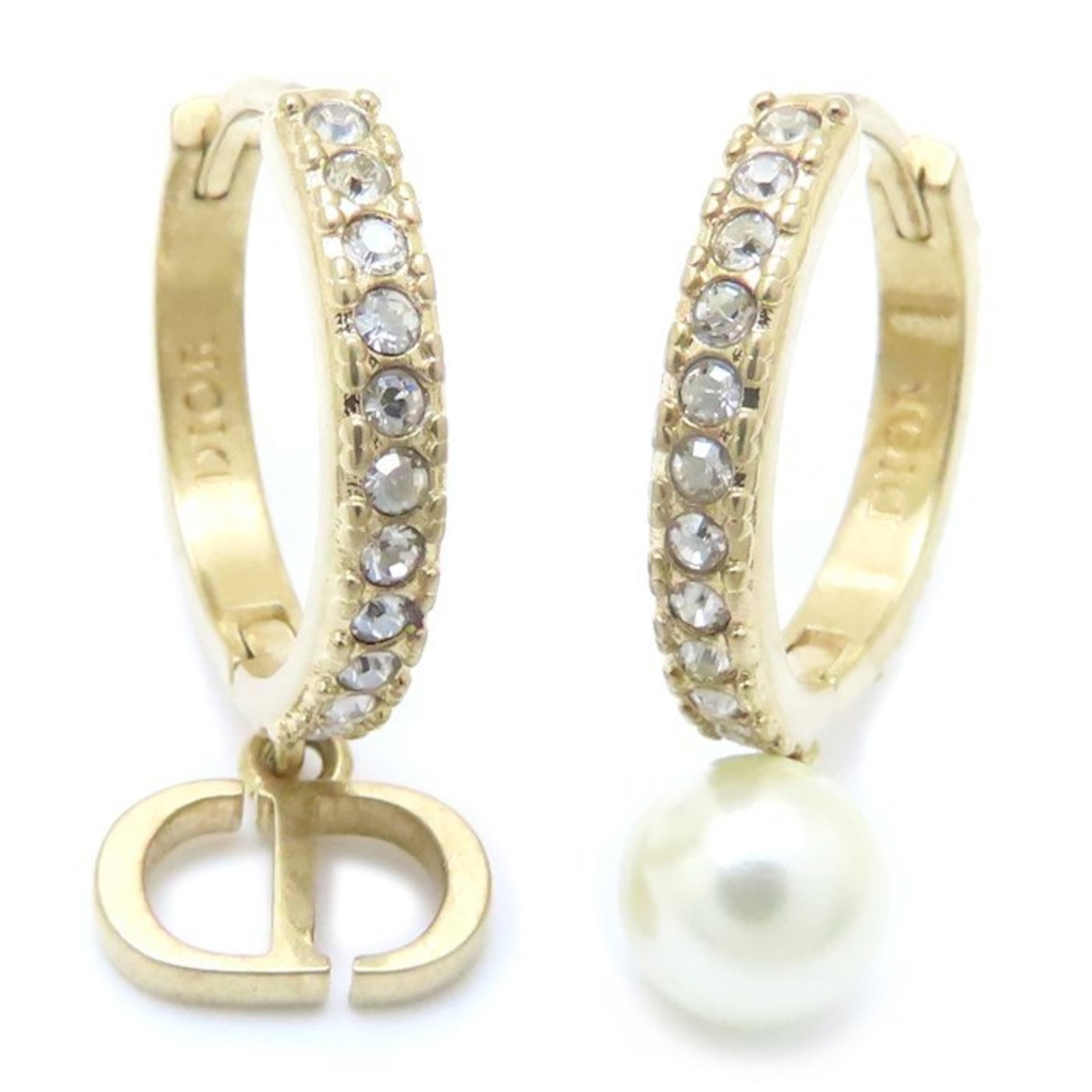 CHRISTIAN DIOR Hoop Earrings Gold Plating: CHRISTIAN DIOR Hoop Earrings Gold Plating Christian Dior's Hoop Earrings in Gold Plating feature artificial pearl and crystal accents, adding a touch of elegance to any outfit. Made from high-quality