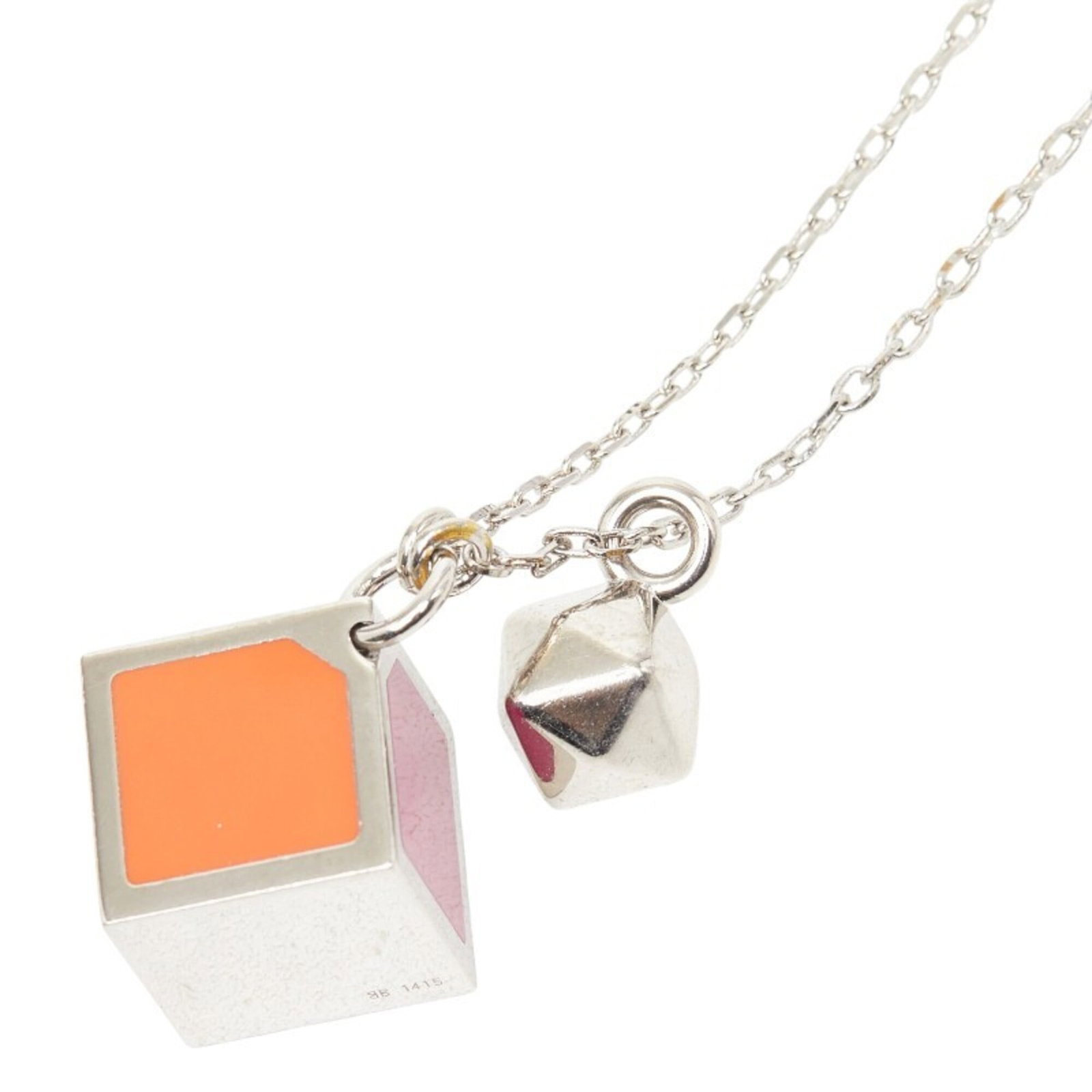 FENDI Metal Orange Pink Silver: FENDI Metal Orange Pink Silver Fendi's Metal Orange Pink Silver necklace boasts a vibrant color combination that adds a pop of personality to any outfit. The necklace features a 22.9mm x 22.9mm pendan