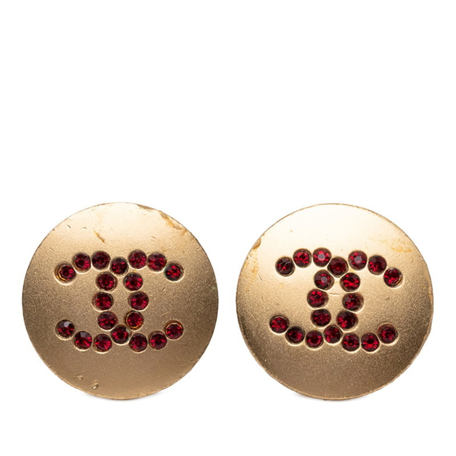 CHANEL Stud Earrings Gold Red Color: CHANEL Stud Earrings Gold Red Color Gold and red stud earrings from the iconic CHANEL brand, featuring a striking color stone. These earrings have a classic design and are made of gold, with visible w