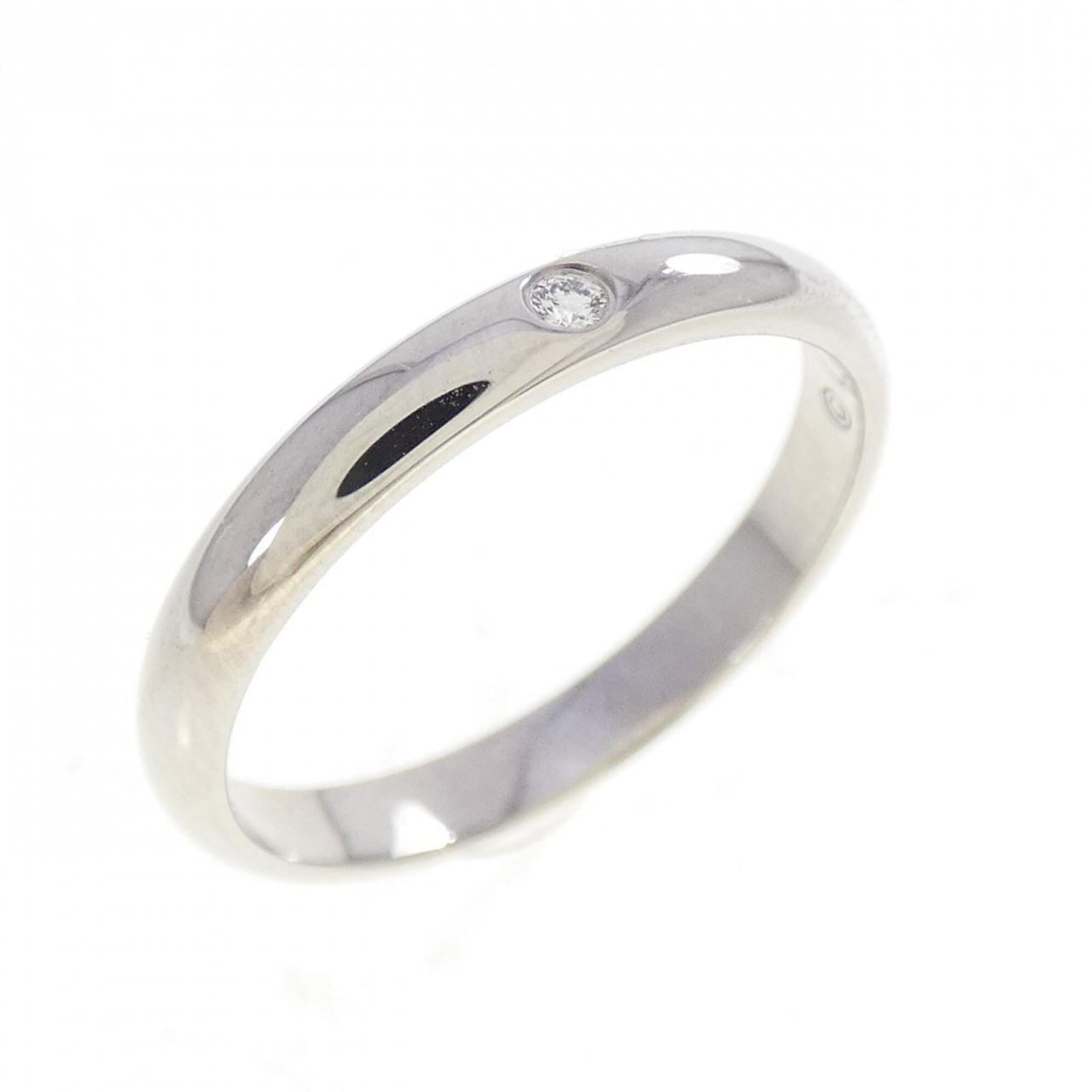 CARTIER Band Ring Platinum 950: CARTIER Band Ring Platinum 950 Platinum 950 band ring from Cartier, featuring a diamond stone, is a gently used piece in very good condition. Minor signs of wear, including small scratches or light ma