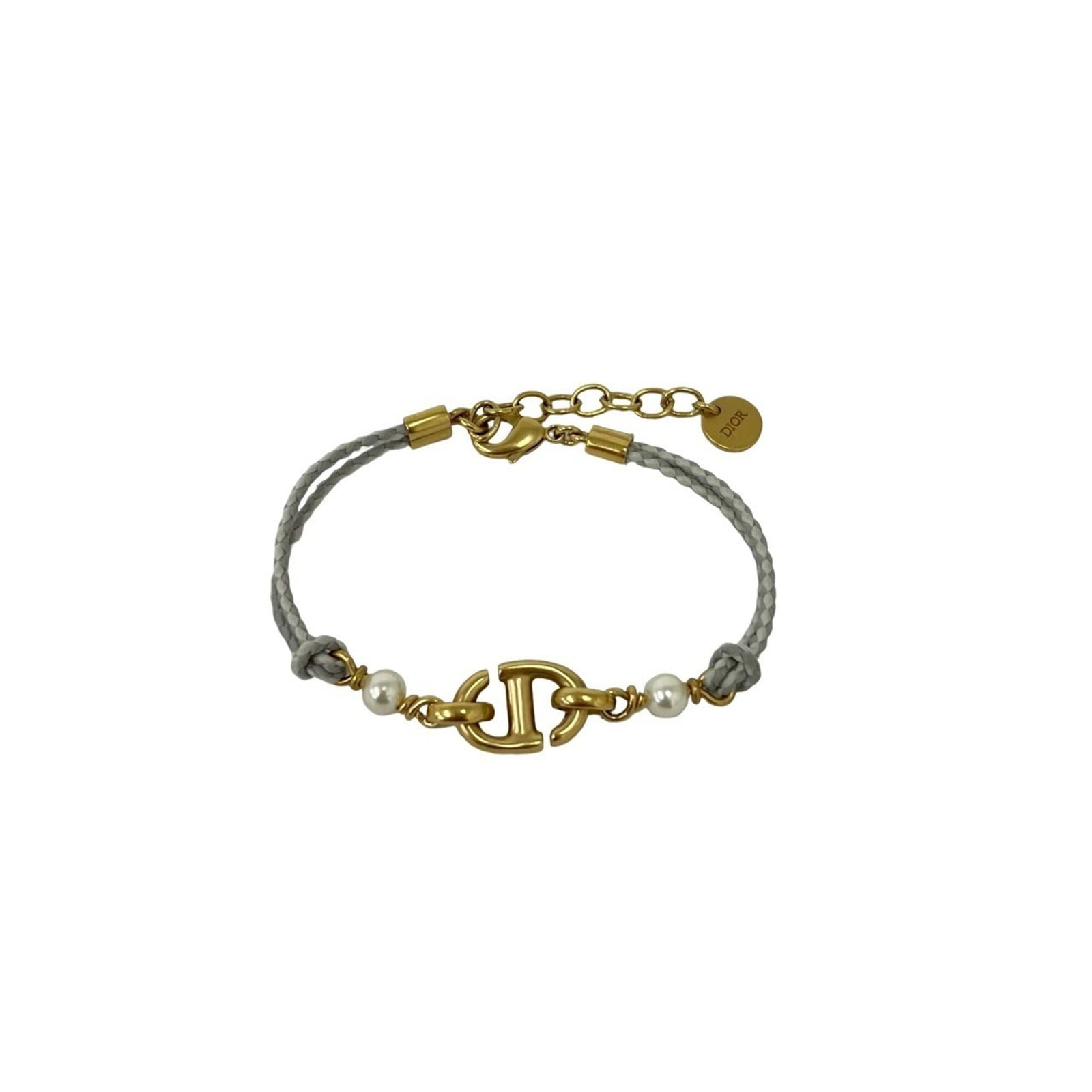 CHRISTIAN DIOR Charm Bracelet Cotton Gold Plating: CHRISTIAN DIOR Charm Bracelet Cotton Gold Plating Cotton Gold Plating Charm Bracelet from Christian Dior, featuring a unique cotton material with a sophisticated gold plating finish in gray, navy,