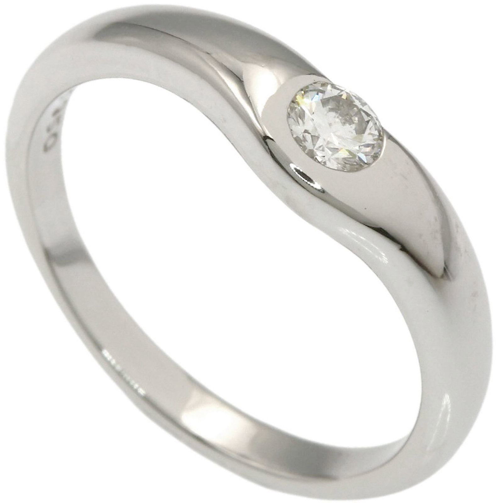 TIFFANY Band Ring Platinum 950: TIFFANY Band Ring Platinum 950 Platinum 950 Tiffany band ring with a diamond stone, available in US size 7, offering a touch of elegance and sophistication. The gently used ring features minor signs o