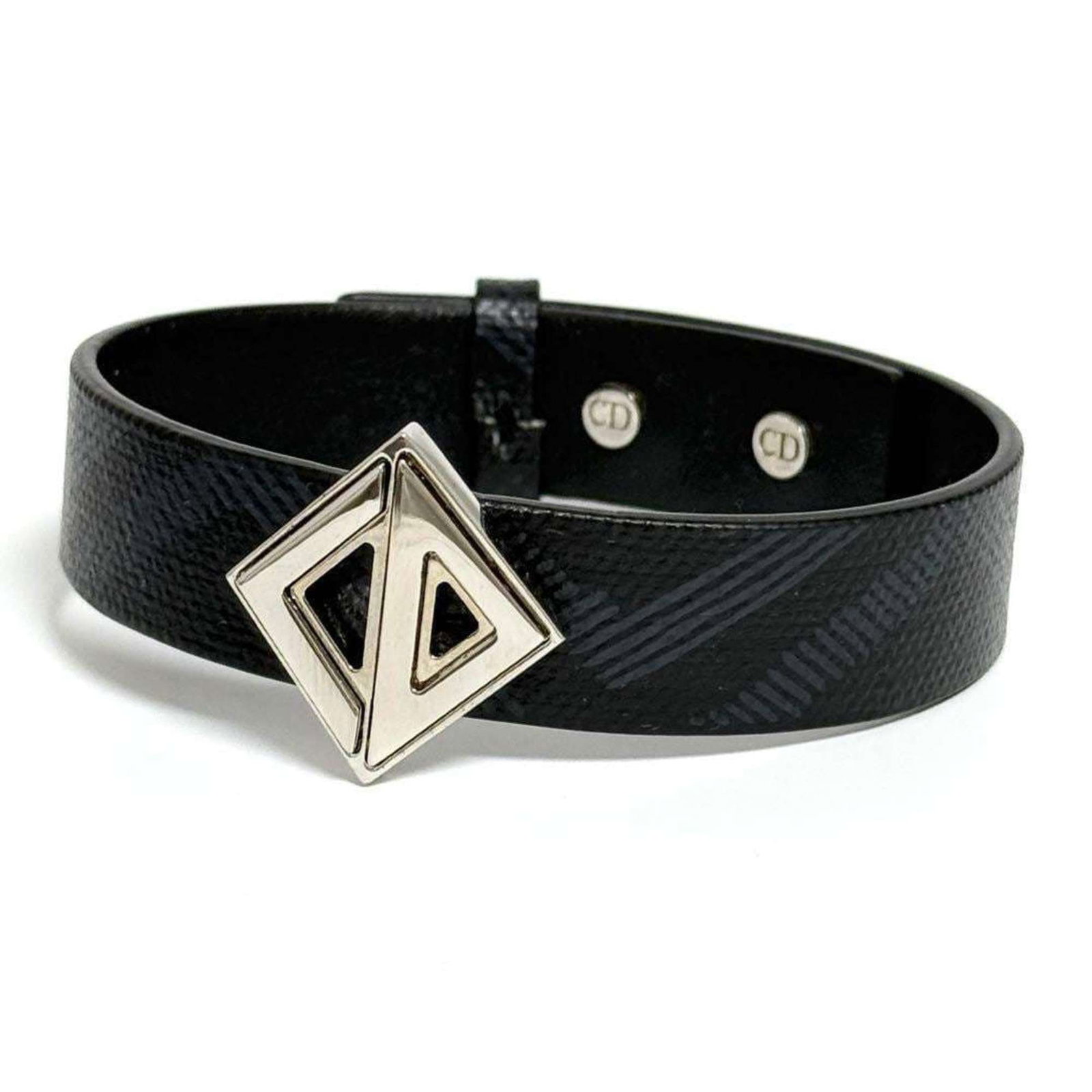 CHRISTIAN DIOR Charm Bracelet Leather Metal: CHRISTIAN DIOR Charm Bracelet Leather Metal Christian Dior Charm Bracelet Leather Metal - A stylish and elegant accessory, this charm bracelet features a combination of leather and metal details in a 