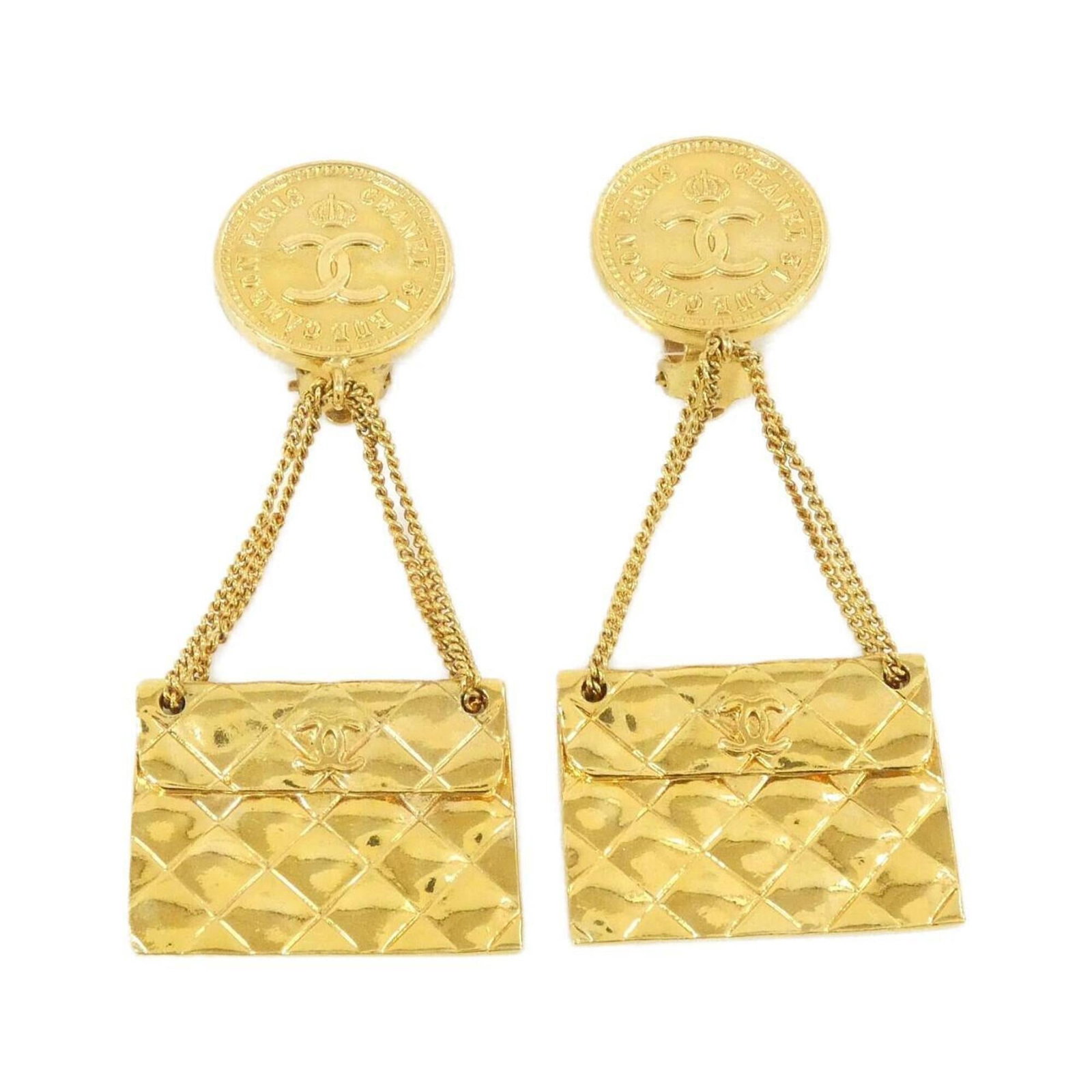 CHANEL Clip Earrings Gold: CHANEL Clip Earrings Gold Clip earrings in gold, bearing the iconic CHANEL logo, are a stylish accessory for any woman. Made with a durable design, these earrings feature a gold finish and a clip-back