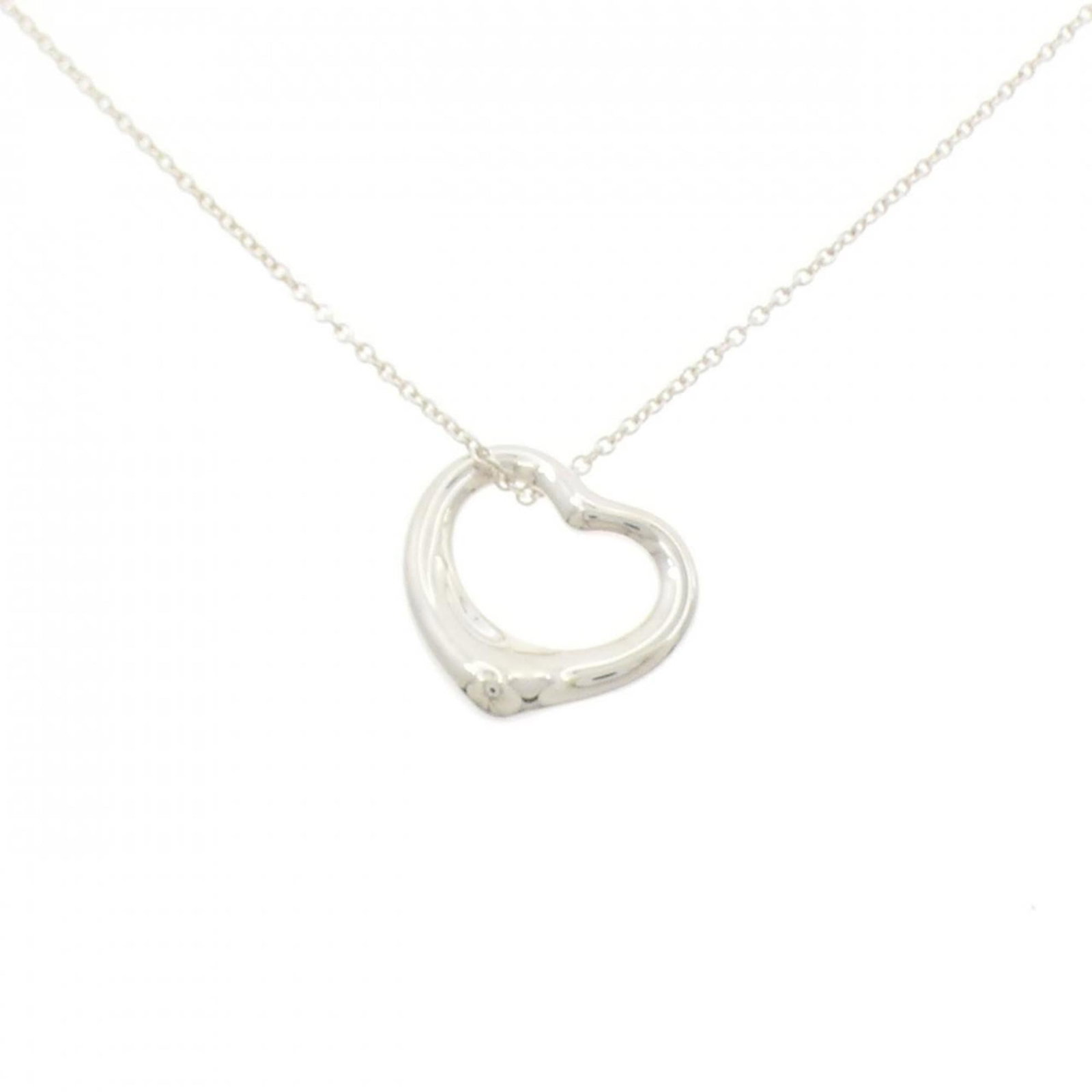 TIFFANY Silver 925: TIFFANY Silver 925 Silver pendant from Tiffany, made from 925 sterling silver, with a 14.9mm x 14.9mm size and a silver color. This necklace features a pendant type pendant with a 41 cm / 16.14'' neck