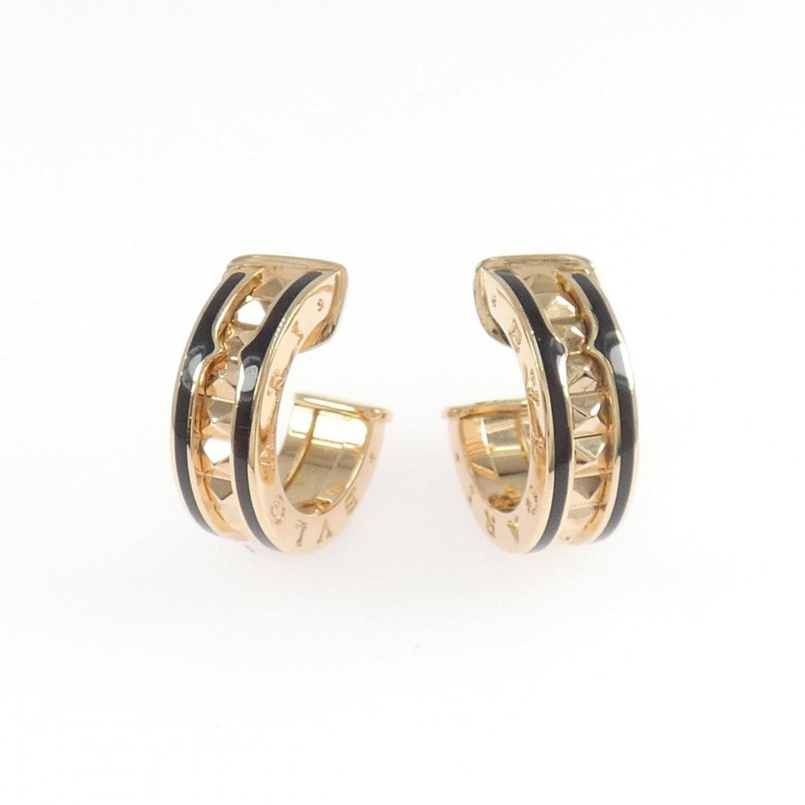 BVLGARI Half Hoop Earrings Ceramic Pink Gold (18K): BVLGARI Half Hoop Earrings Ceramic Pink Gold (18K) Ceramic Pink Gold (18K) BVLGARI half hoop earrings in a striking black finish, adorned with delicate pink gold accents. These elegant earrings