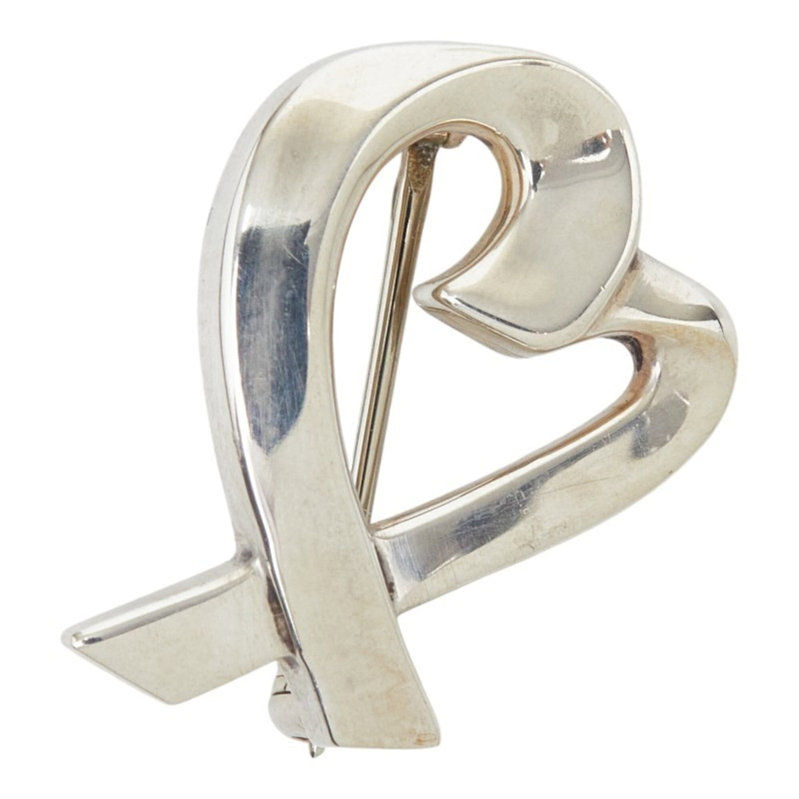 TIFFANY Brooch Silver 925: TIFFANY Brooch Silver 925 Silver 925 Tiffany Brooch with a classic Loving Heart design, this elegant piece features a subtle shine and a touch of vintage charm. Measuring 2.06cm x 1.53cm, it weighs