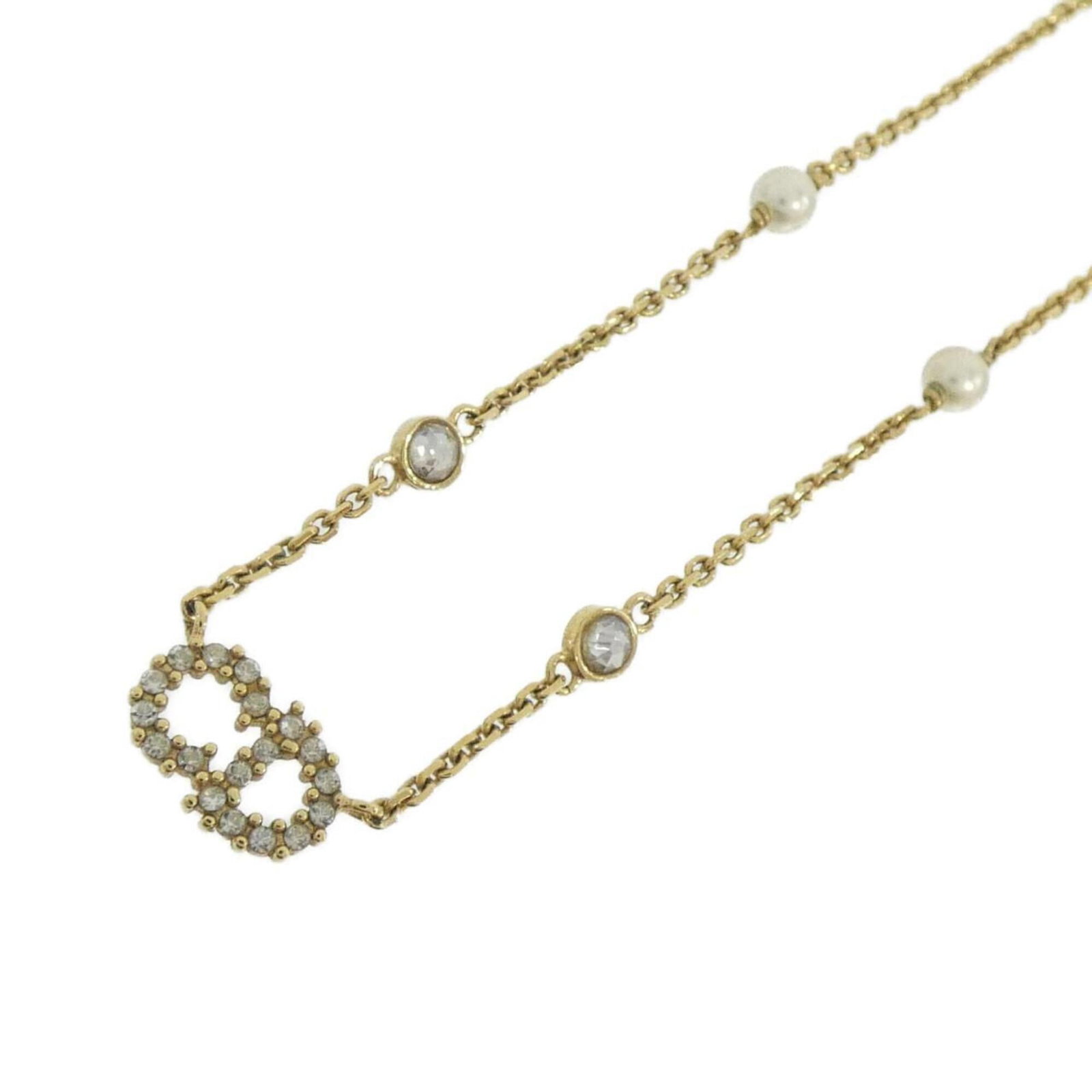CHRISTIAN DIOR Clear White: CHRISTIAN DIOR Clear White The CHRISTIAN DIOR Clear White necklace boasts a sleek, crystal-clear design, featuring a 8mm x 12mm pendant that adds a touch of sophistication to any outfit. Made from hig