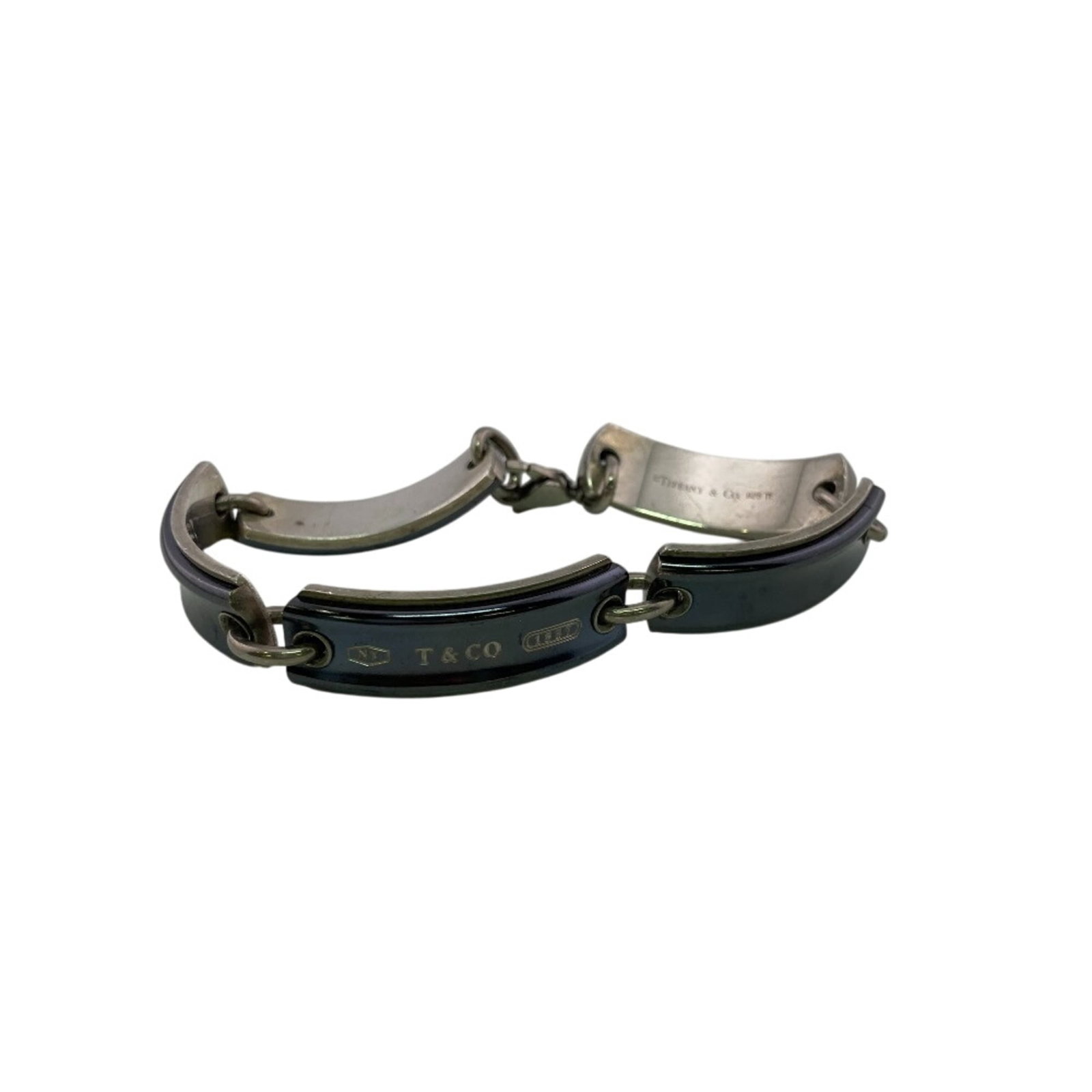 TIFFANY Charm Bracelet Silver 925 Titanium: TIFFANY Charm Bracelet Silver 925 Titanium Silver 925, Titanium Tiffany Charm Bracelet 21cm / 8.26'' in Good Used Condition. This charm bracelet features a silver 925 and titanium construction, with v