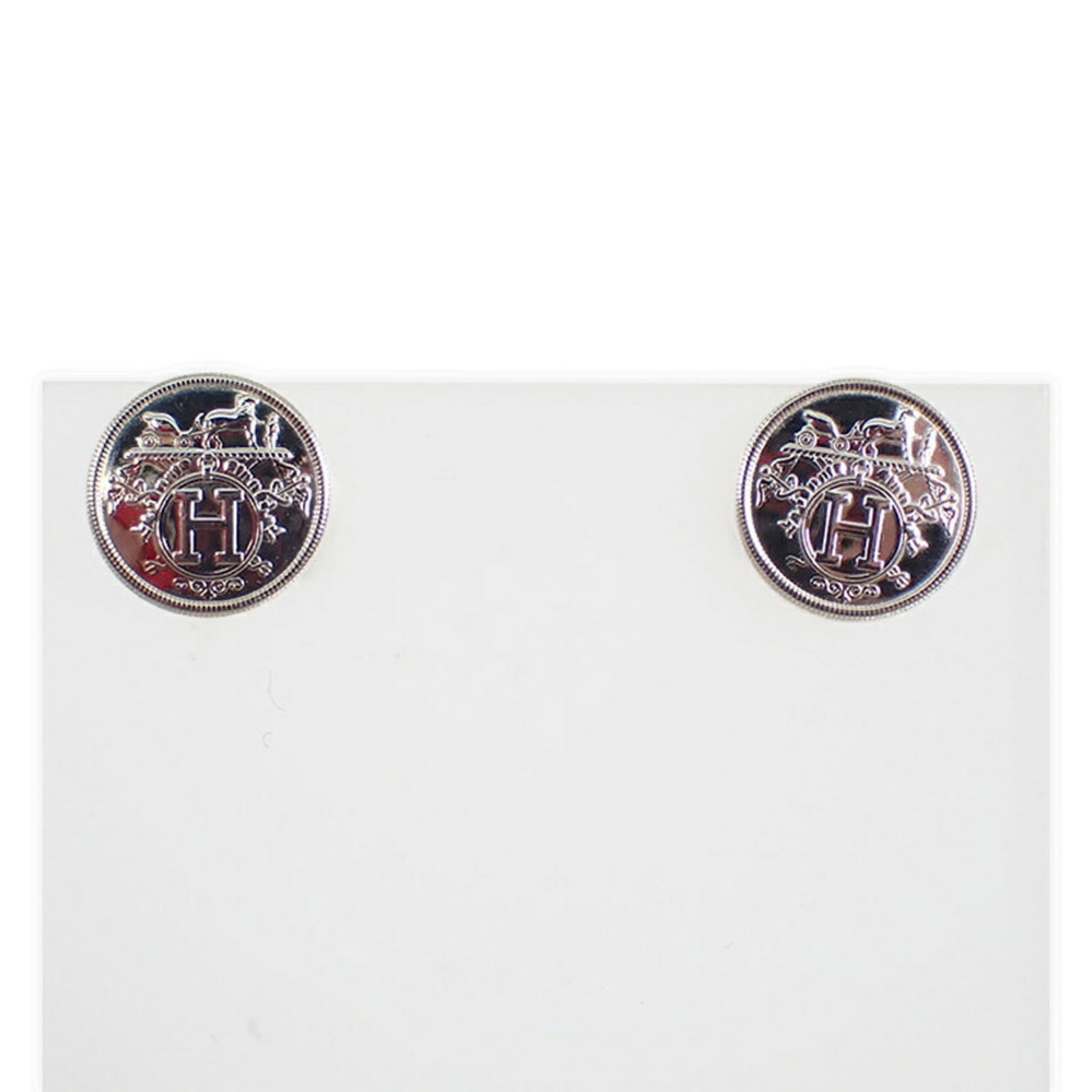 HERMES Stud Earrings Silver 925: HERMES Stud Earrings Silver 925 Silver 925 Stud Earrings from Hermes feature a sleek design that adds a touch of sophistication to any outfit. Gently used with minor signs of wear, these earrings