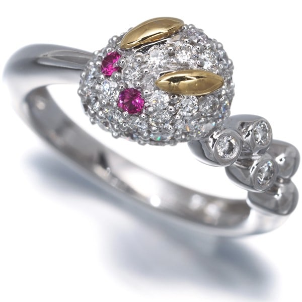 Diamond 0.37Ct Ruby 0.01Ct Rabbit Pinky Paved Ring 18K 750 Yellow White Gold: Diamond 0.37Ct Ruby 0.01Ct Rabbit Pinky Paved Ring 18K 750 Yellow White Gold This 18k yellow and white gold ring showcases a stunning 0.37ct diamond and a rare 0.01ct ruby, expertly set in a