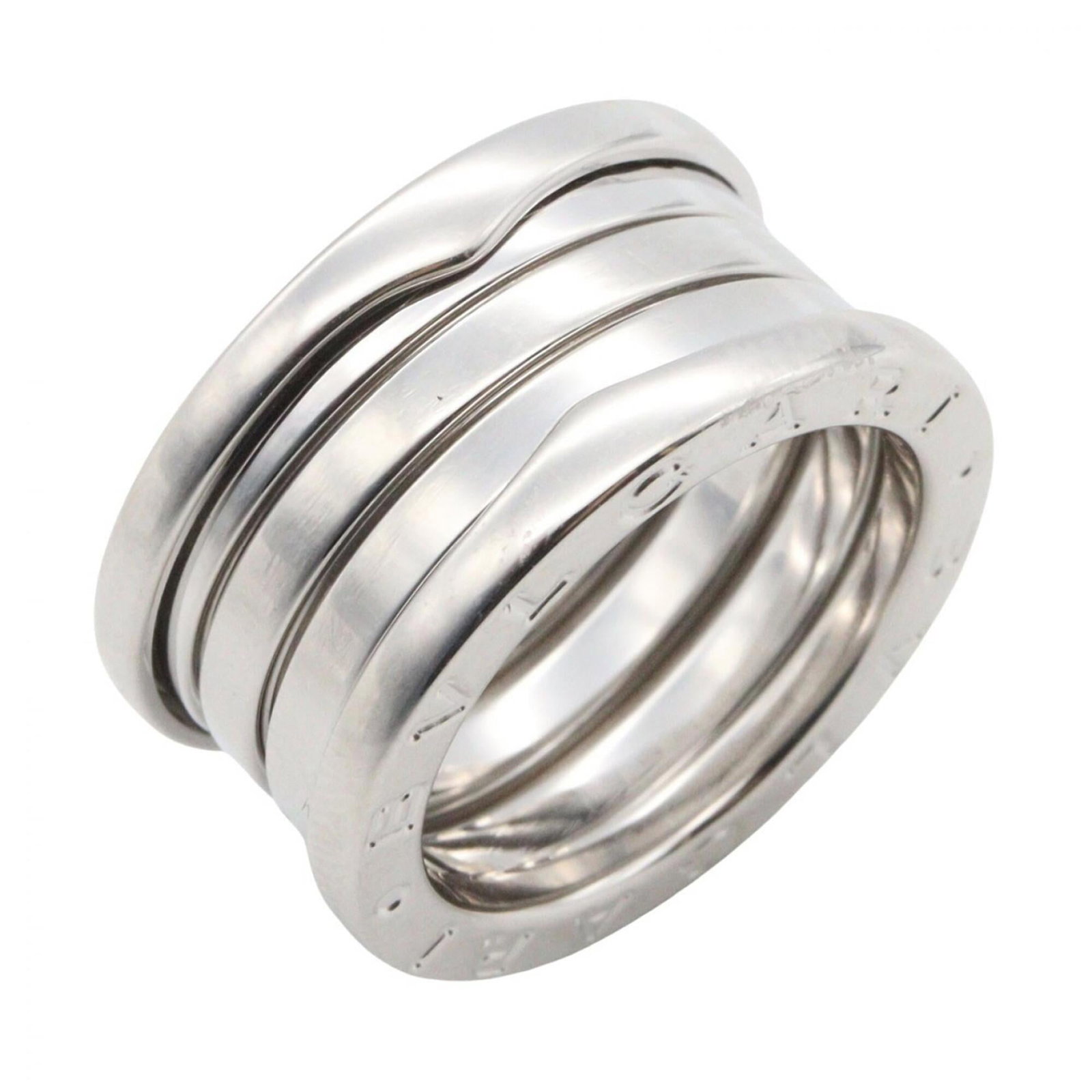 BVLGARI Band Ring White Gold (18K): BVLGARI Band Ring White Gold (18K) White gold (18K) BVLGARI Band Ring in excellent condition, with only the faintest traces of wear. This like new used band ring features the iconic BVLGARI design, cr