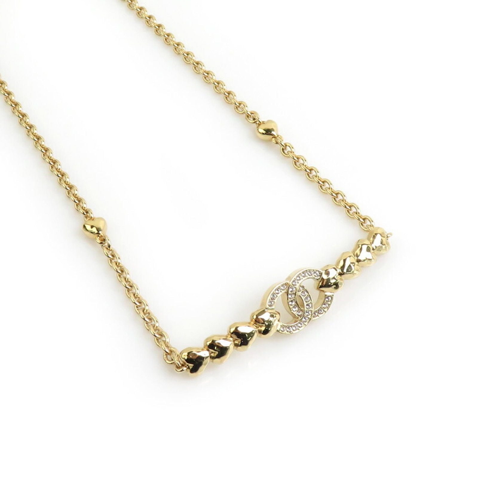 CHANEL Metal Rhinestone: CHANEL Metal Rhinestone Gold metal and rhinestone pendant, 13mm x 60mm in size, set in a necklace with a 84 cm gold neck circumference. This Chanel necklace features a metal and rhinestone design, gen