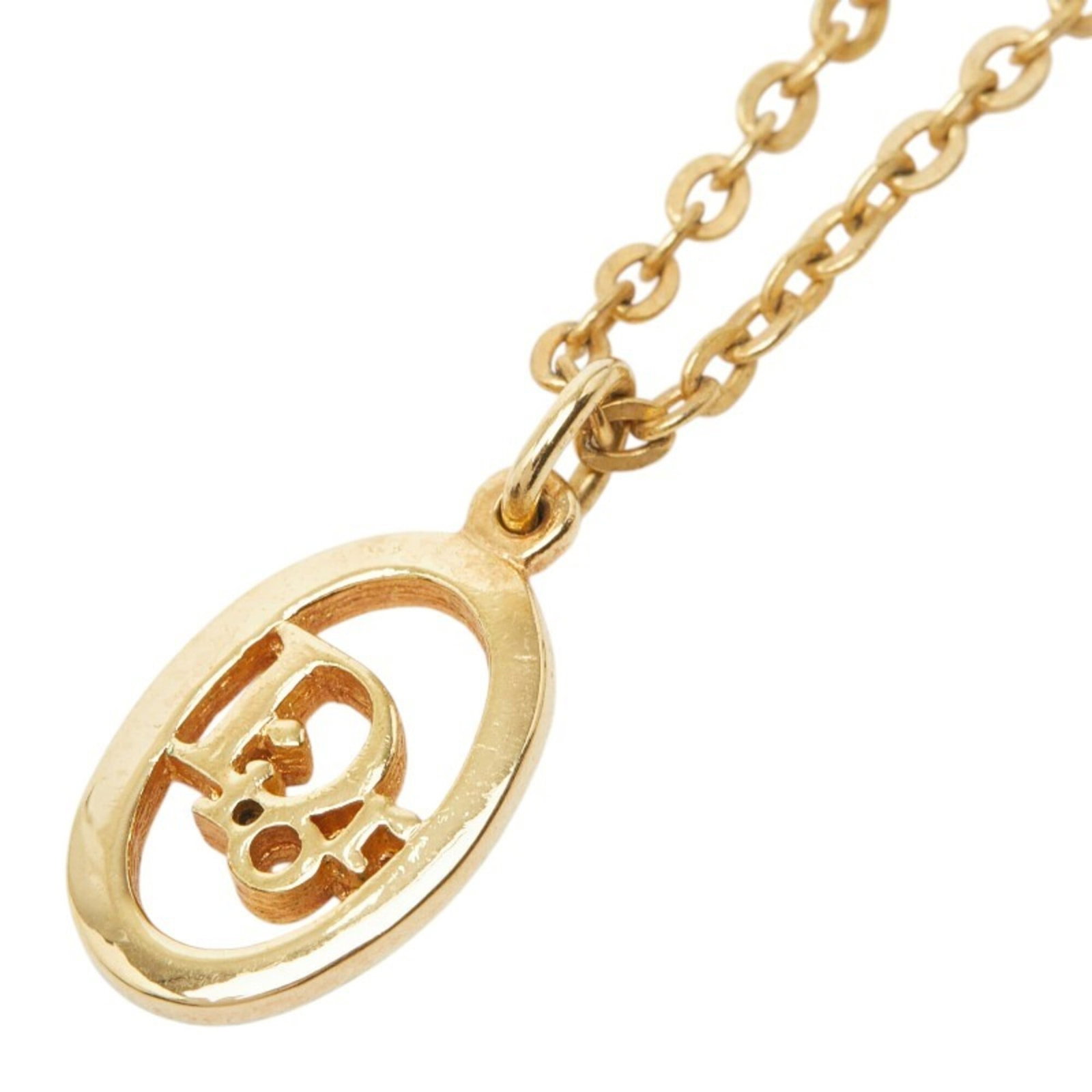 CHRISTIAN DIOR Gold Plating: CHRISTIAN DIOR Gold Plating Gold plating from Christian Dior adds a touch of luxury to any outfit. This 43 cm necklace features a 15.7mm x 11.2mm pendant and is made from gold plating, with visible