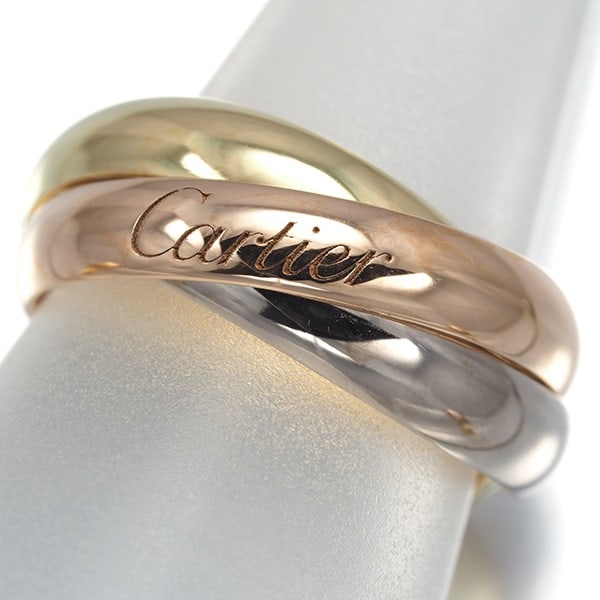 Cartier Ring Trinity 3Color Classic Eu48 18K 750 Yellow White Rose Gold: Cartier Ring Trinity 3Color Classic Eu48 18K 750 Yellow White Rose Gold Cartier's iconic Trinity ring is a masterful blend of 18k yellow, white, and rose gold, expertly crafted in a classic Eu48 desig