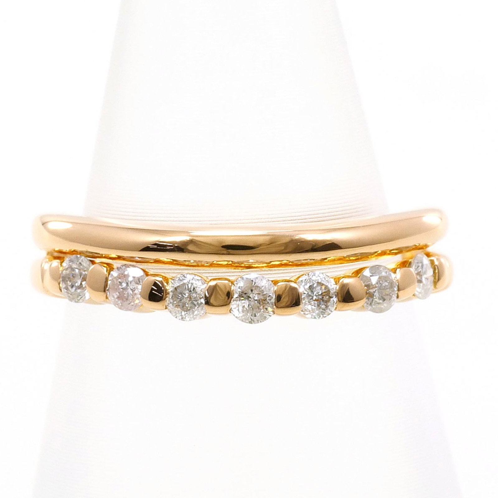 Band Ring Pink Gold (18K): Band Ring Pink Gold (18K) Pink gold 18K band ring with a diamond weighing 0.19 carats, set in a 2.5 US size ring with a 4mm width. This like new used ring features the faintest traces of wear and may