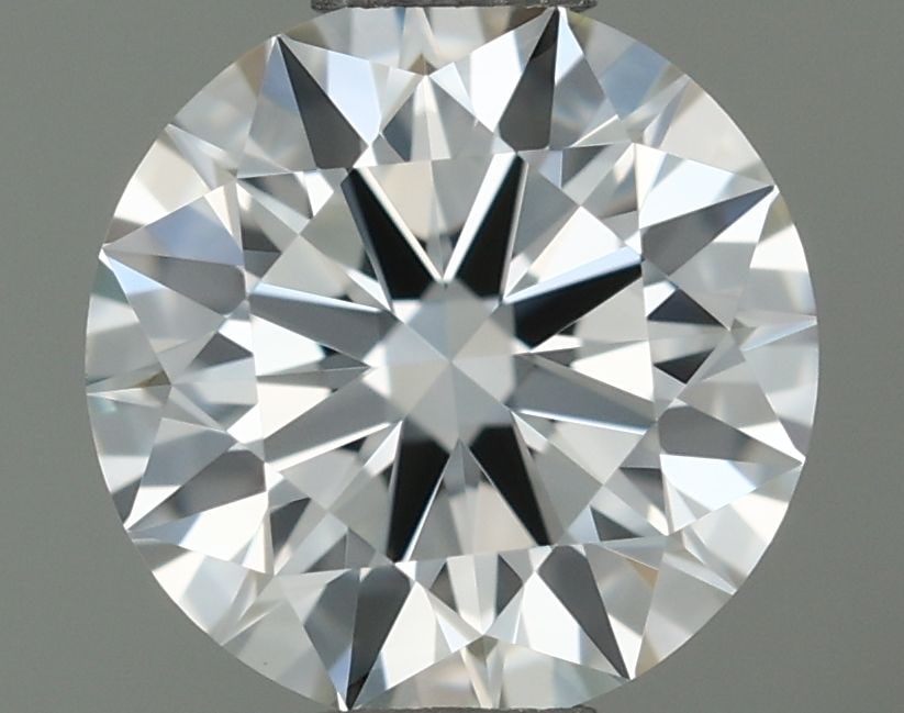 IGI Round 0.56ct H VVS1 - Loose Natural Diamond: IGI Round 0.56ct H VVS1 - Loose Natural Diamond 0.56ct IGI Round H VVS1 Diamond - Natural BeautyThis exquisite 0.56ct round diamond boasts exceptional clarity, with a VVS1 grade indicating minimal