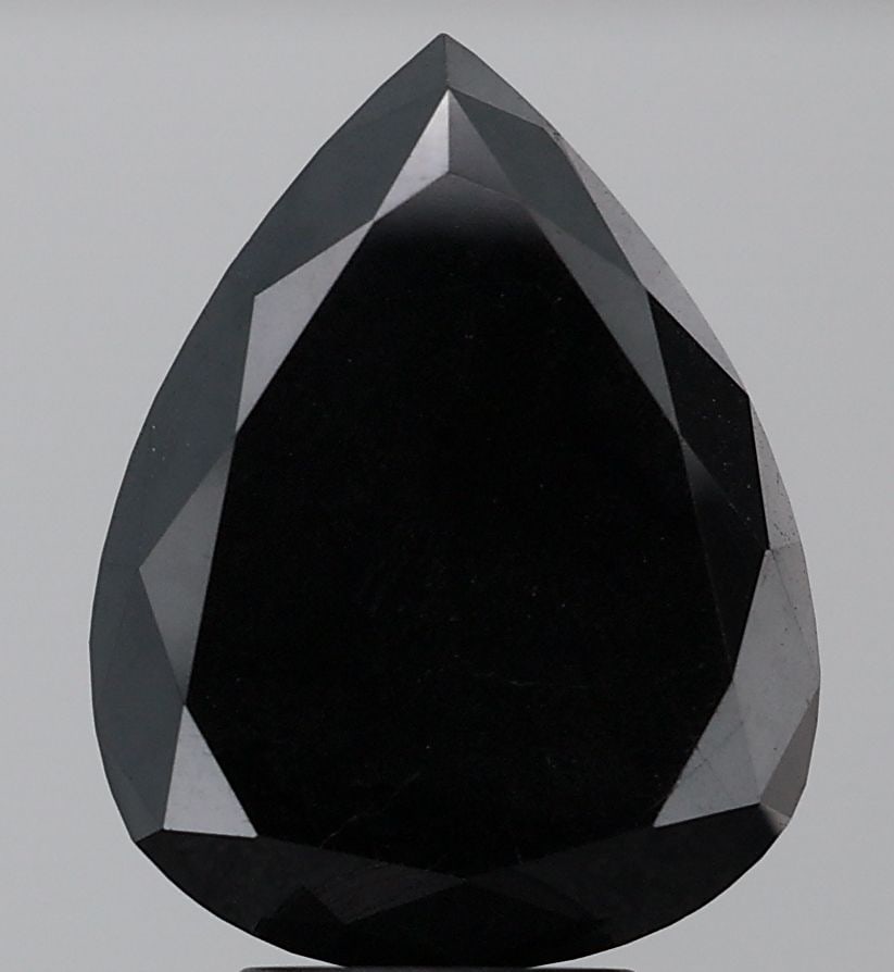 Pear 6.4ct Black VVS2 - Loose Natural Diamond: Pear 6.4ct Black VVS2 - Loose Natural Diamond 6.4ct Black VVS2 - Loose Natural Diamond, a rare and striking gemstone, boasts an EX polish and symmetry, giving it a brilliant appearance. Certified as a
