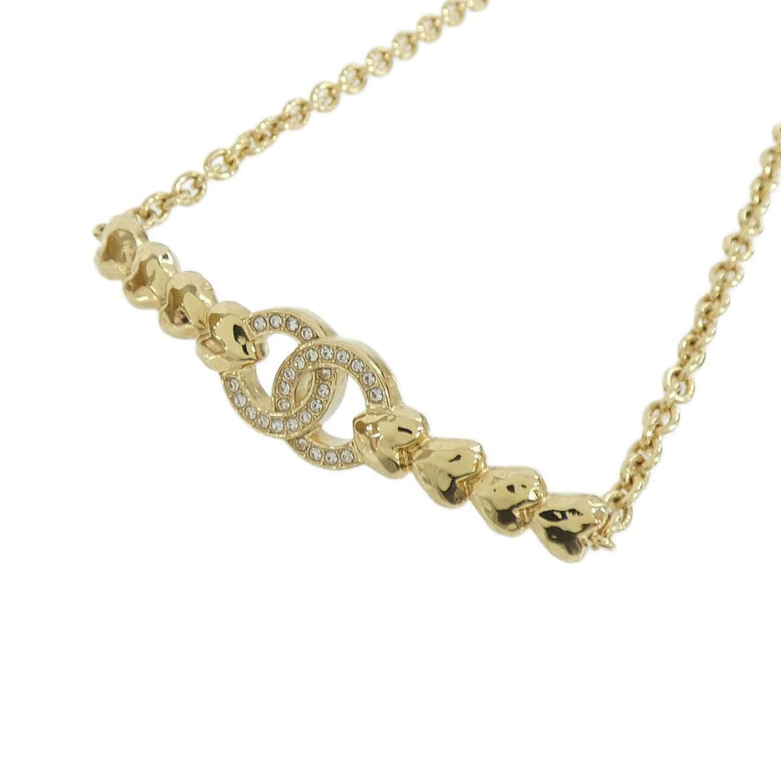 CHANEL Clear Gold: CHANEL Clear Gold Clear Gold Necklace from Chanel, featuring a 12mm x 60mm pendant with a 31 cm - 38 cm adjustable neck circumference, available in very good condition with minor signs of wear. The