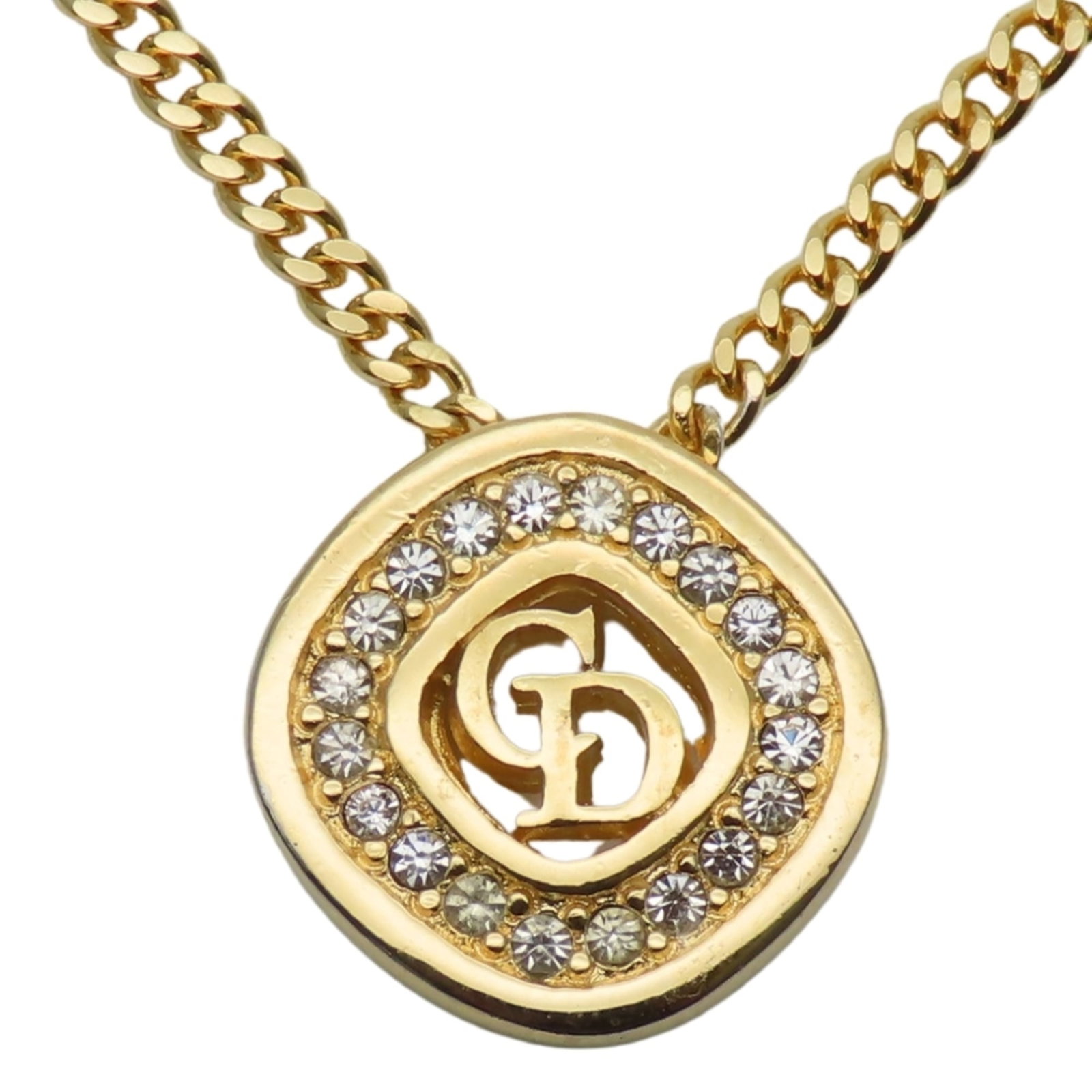 CHRISTIAN DIOR Metal: CHRISTIAN DIOR Metal Gold Rhinestone Pendant Necklace from Christian Dior, featuring a 14.9mm x 14.9mm rhinestone pendant set in metal, measures 43.5 cm in circumference, and weighs 6.7g. This gently 