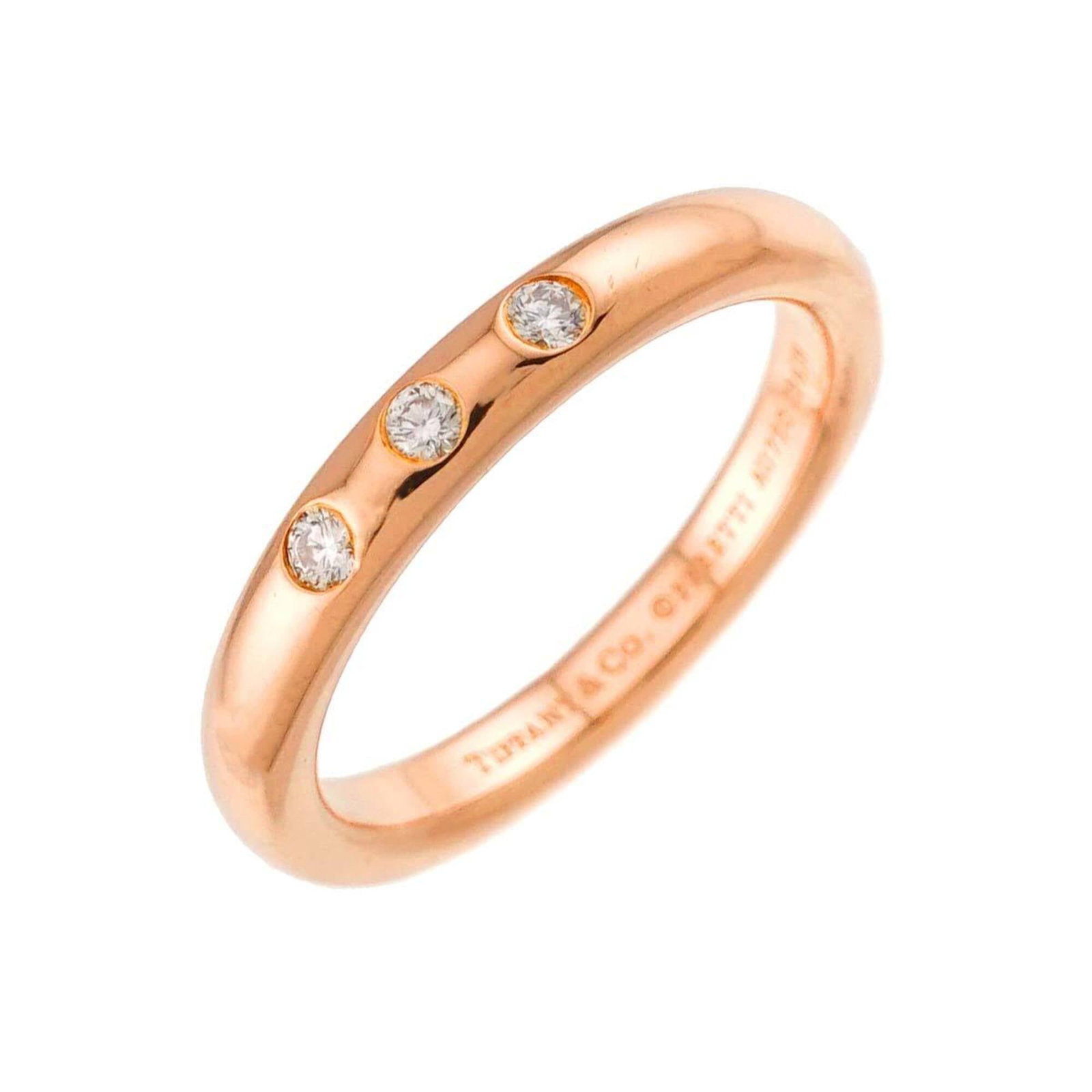 TIFFANY Band Ring Pink Gold (18K): TIFFANY Band Ring Pink Gold (18K) Pink gold (18K) band ring from Tiffany, featuring a classic design. This like new used ring boasts excellent condition with no visible wear, making it a great option 