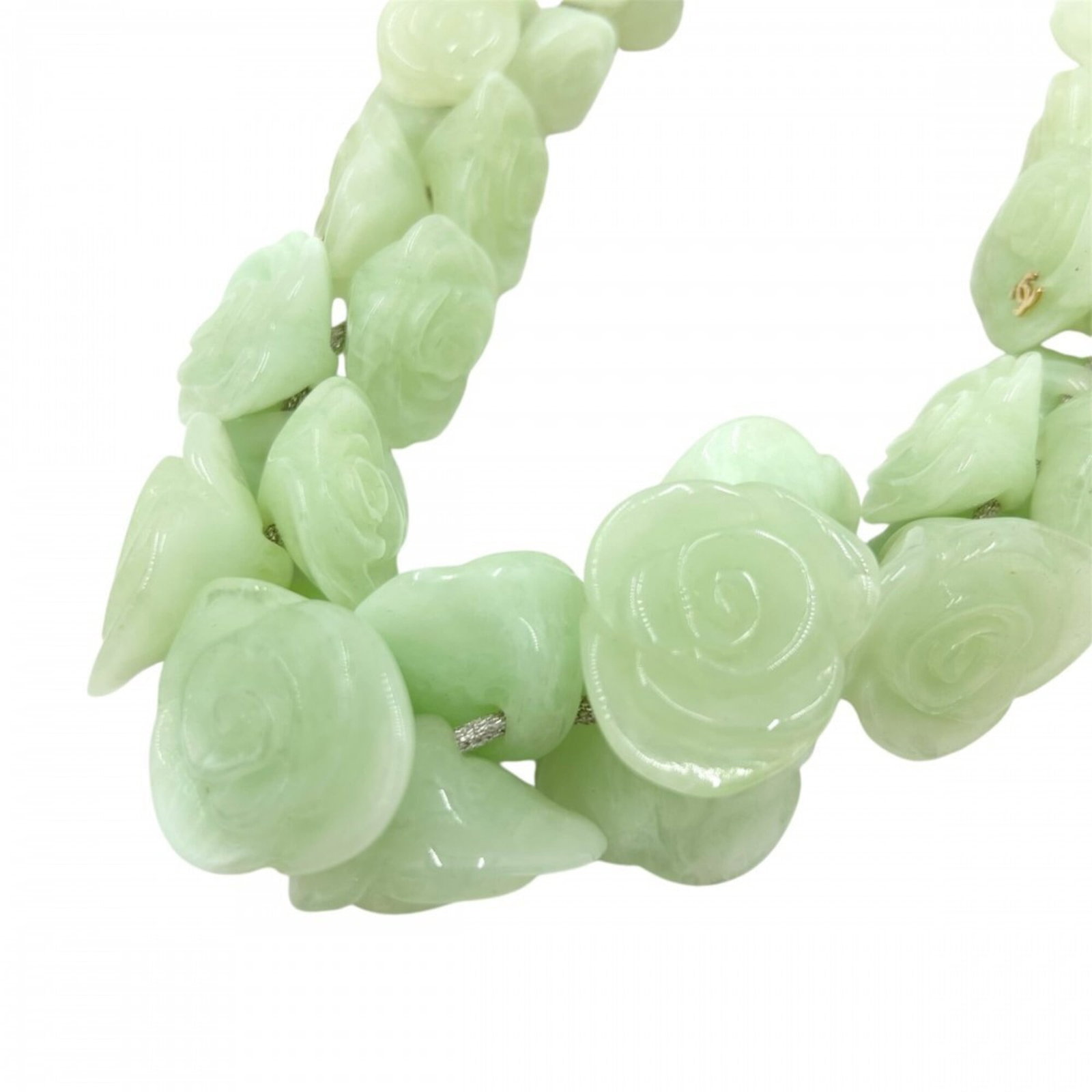 CHANEL Green Necklace: CHANEL Green Necklace The CHANEL Green Necklace is a statement piece with a striking green hue, featuring a 5mm width and a durable construction. This pre-owned necklace showcases the iconic Coco desi
