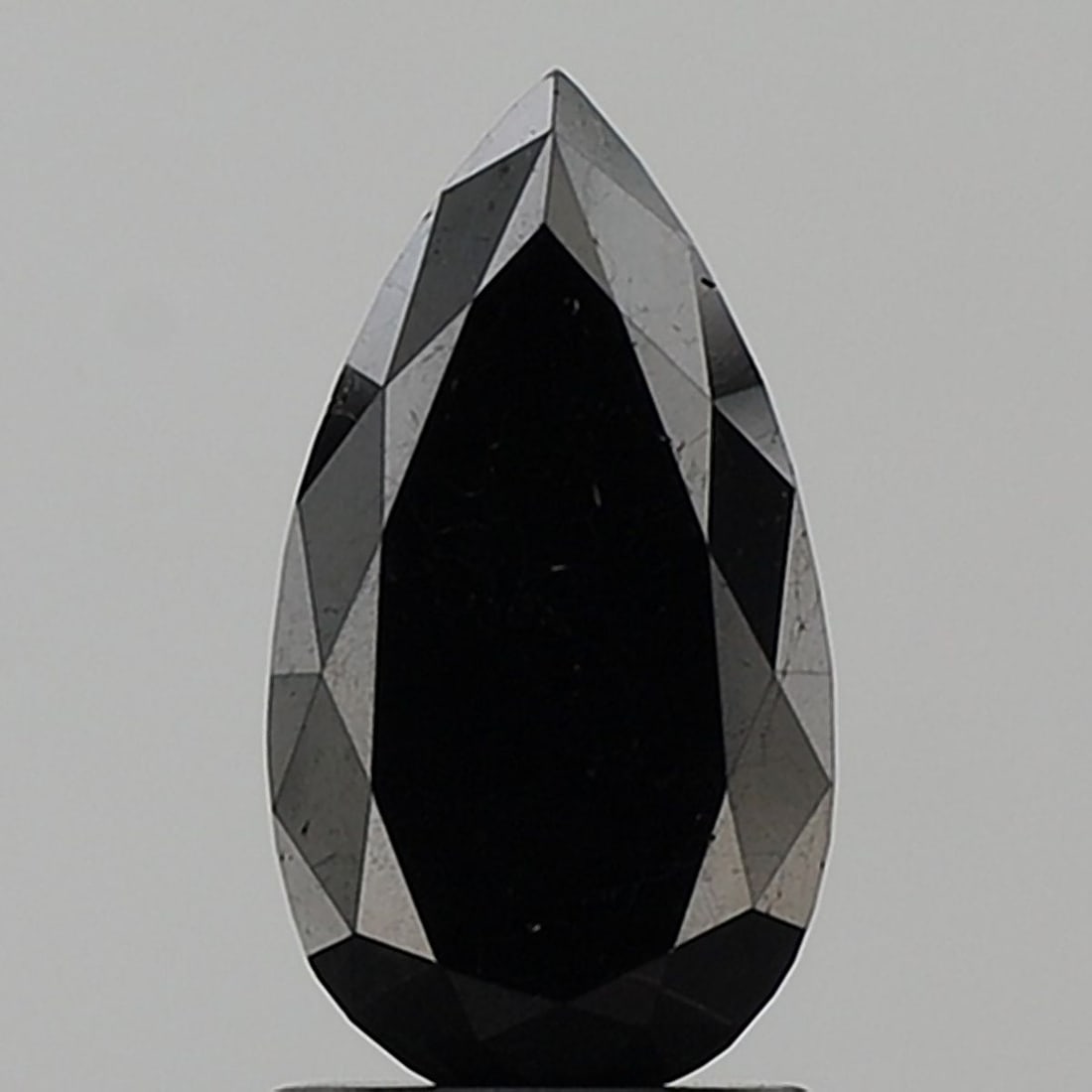 Pear 1.77ct Black VVS2 - Loose Natural Diamond: Pear 1.77ct Black VVS2 - Loose Natural Diamond 1.77ct Black VVS2 - A rare and exceptional natural diamond, boasting an EX polish and symmetry, and certified with a VVS2 clarity. Its unique black