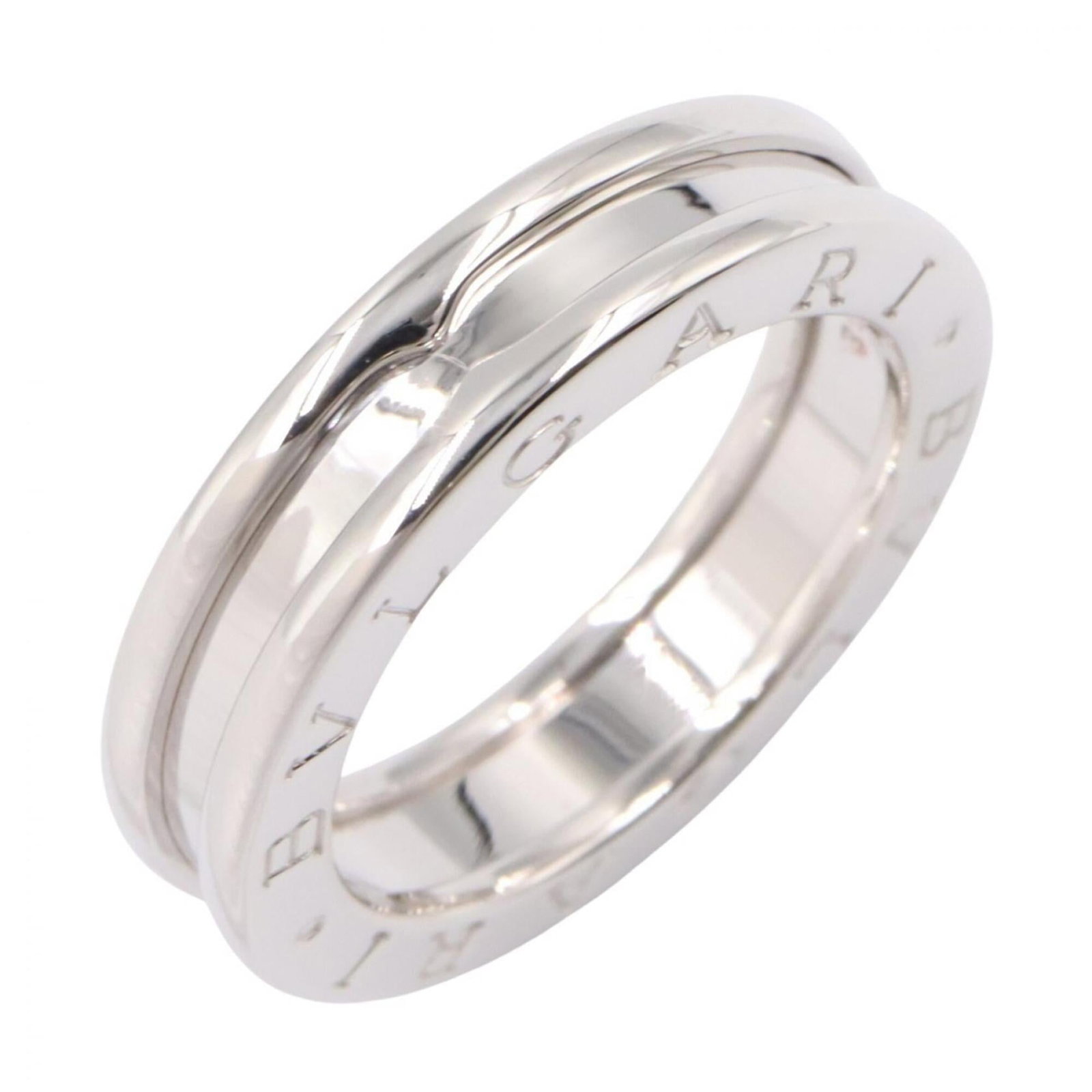 BVLGARI Band Ring White Gold (18K): BVLGARI Band Ring White Gold (18K) Bvlgari Band Ring White Gold (18K) is a sleek and sophisticated silver band ring made from 18K white gold. Its elegant design makes it a versatile accessory for