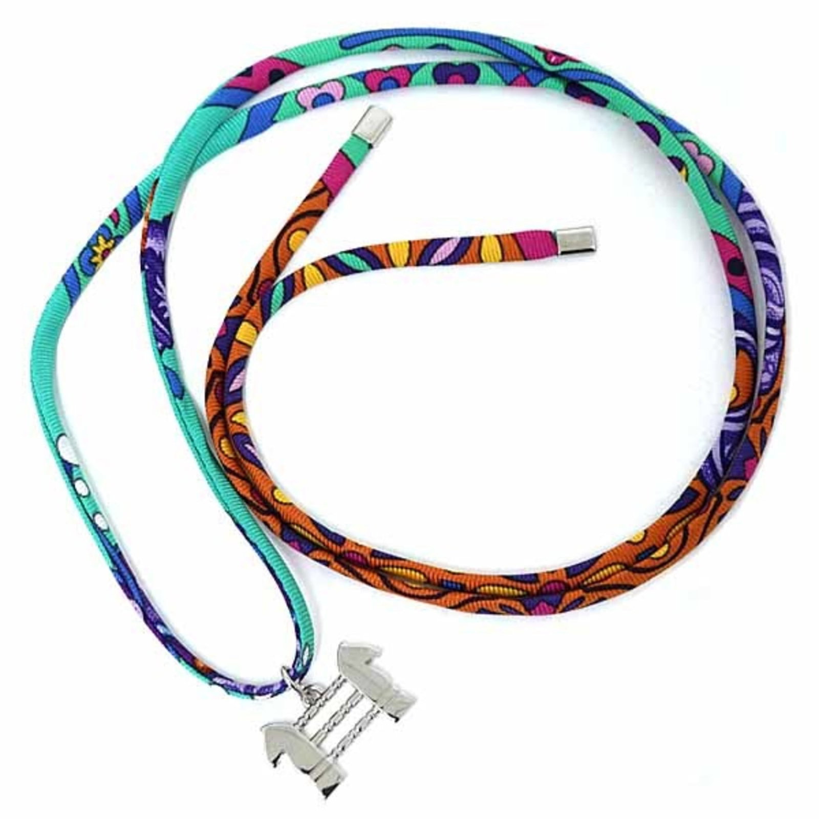 HERMES Charm Bracelet Silk: HERMES Charm Bracelet Silk The Hermes Charm Bracelet Silk boasts a stunning green silk material, carefully crafted into a 82cm long charm bracelet. Gently used with minor signs of wear, this piece