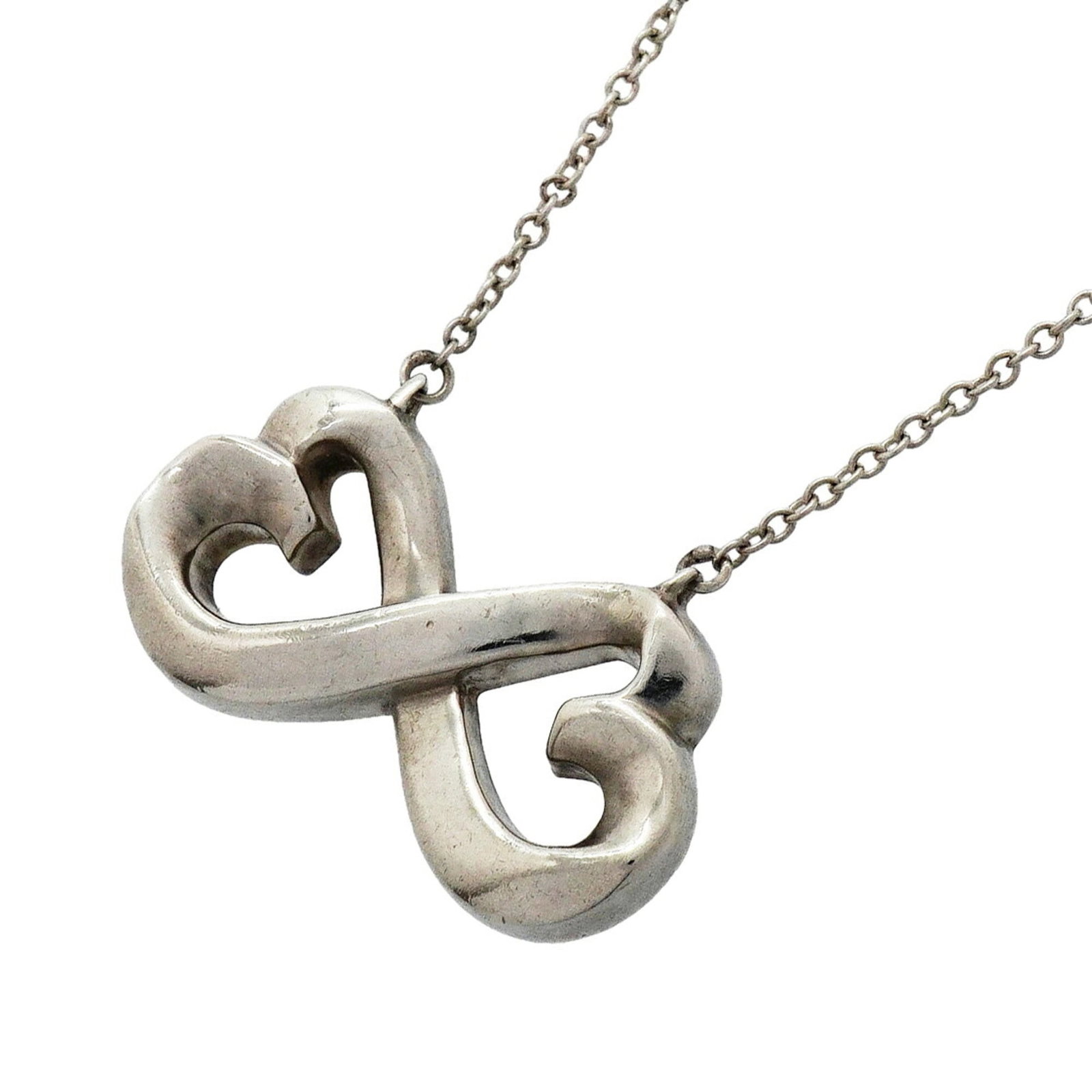 TIFFANY Silver 925: TIFFANY Silver 925 Silver 925 Tiffany necklace with a 12.9mm x 21.9mm pendant, featuring a 43.5 cm / 17.12'' adjustable neck circumference, bearing a signature. The necklace is made of high-quality