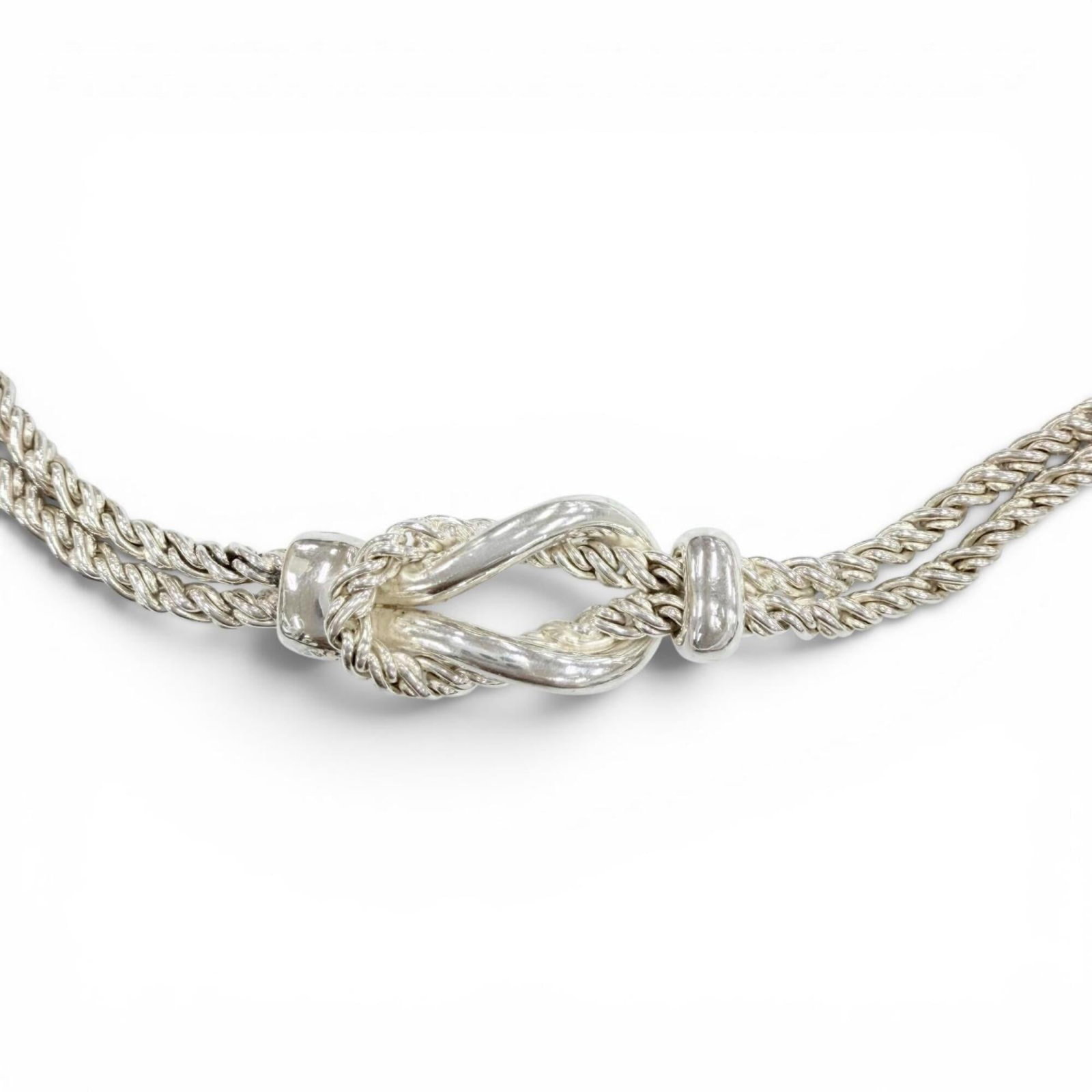 TIFFANY Silver 925: TIFFANY Silver 925 Silver pendant from Tiffany, Italy, measuring 11mm x 25mm, features a delicate design on a 42 cm chain. The necklace is made of 925 silver and bears a signature. Gently used with