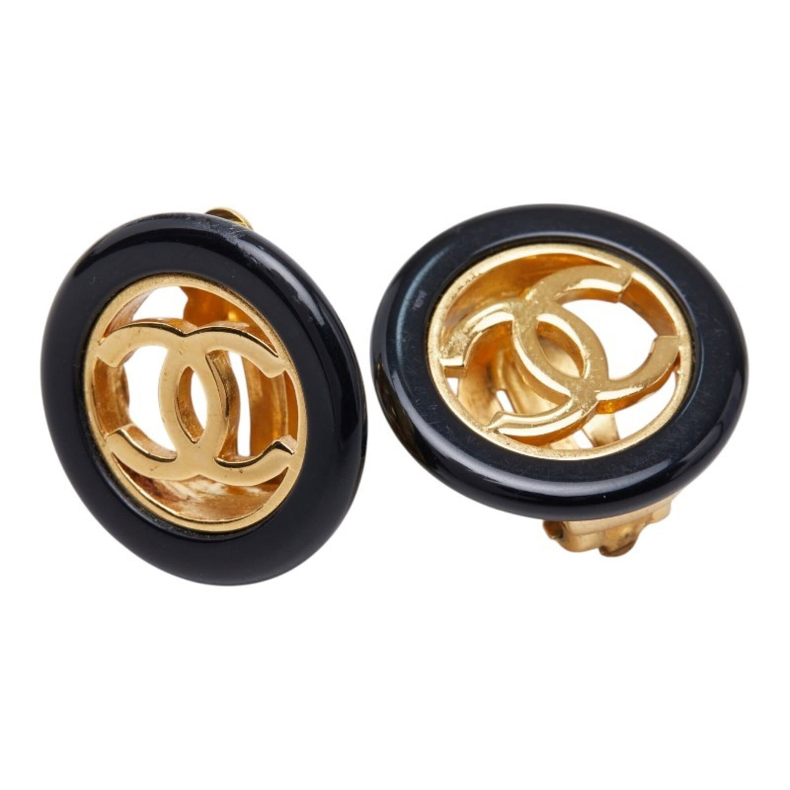 CHANEL Plastic Black Gold: CHANEL Plastic Black Gold Chanel Plastic Black Gold is a 24.20mm x 24.20mm, very good condition piece featuring a black gold finish with a subtle sheen. Gently used with minor signs of wear, it