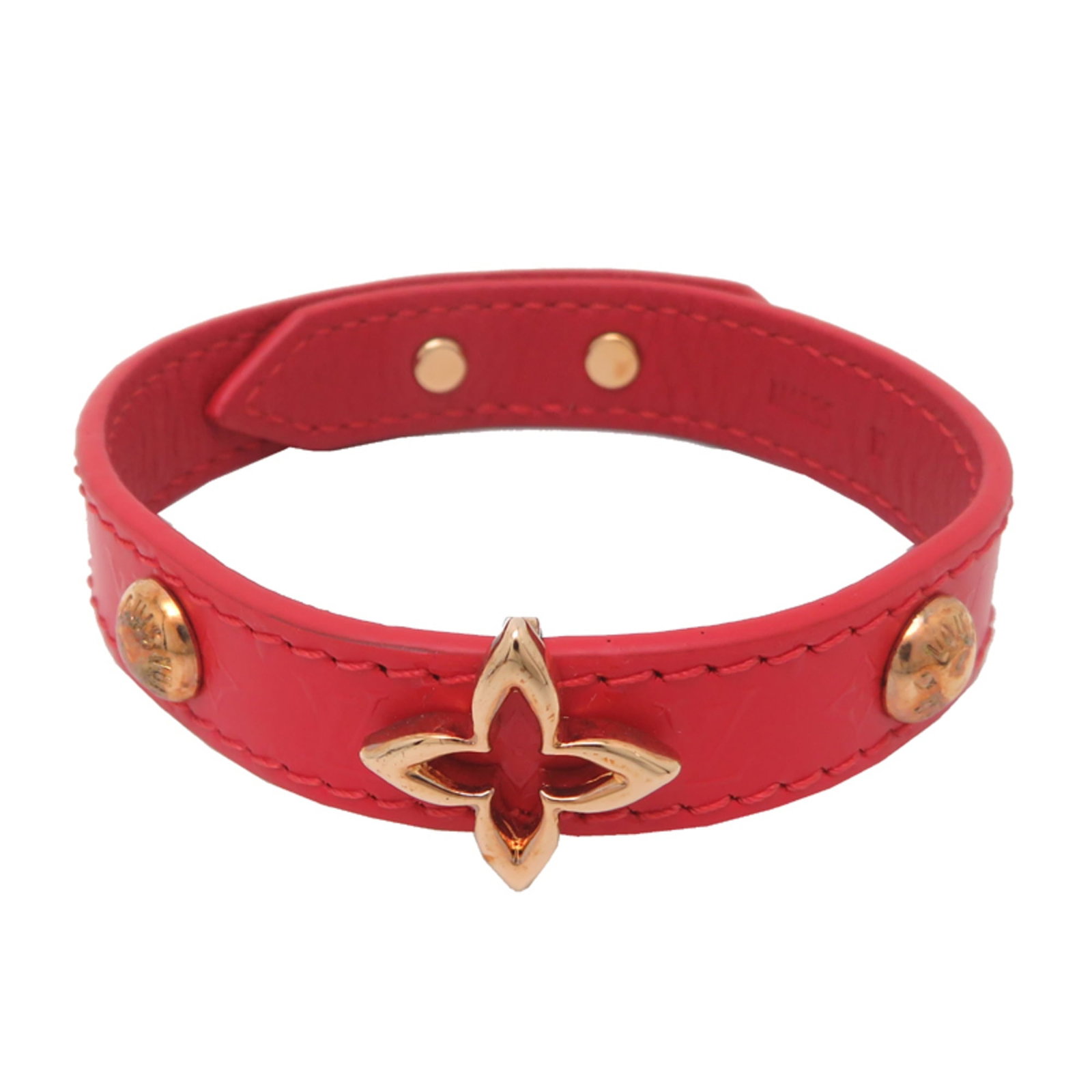 LOUIS VUITTON Charm Bracelet Leather Monogram: LOUIS VUITTON Charm Bracelet Leather Monogram Leather monogram charm bracelet in gold and red, crafted by Louis Vuitton, features the iconic brand's signature style. Made from high-quality leather and