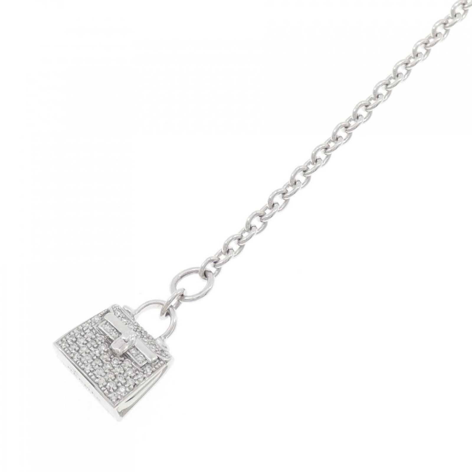 HERMES Charm Bracelet White Gold (18K): HERMES Charm Bracelet White Gold (18K) White gold (18K) charm bracelet from the iconic Hermes Kelly line, featuring a 0.49ct diamond and measuring 16.5cm in length. Gently used with minor signs of wea