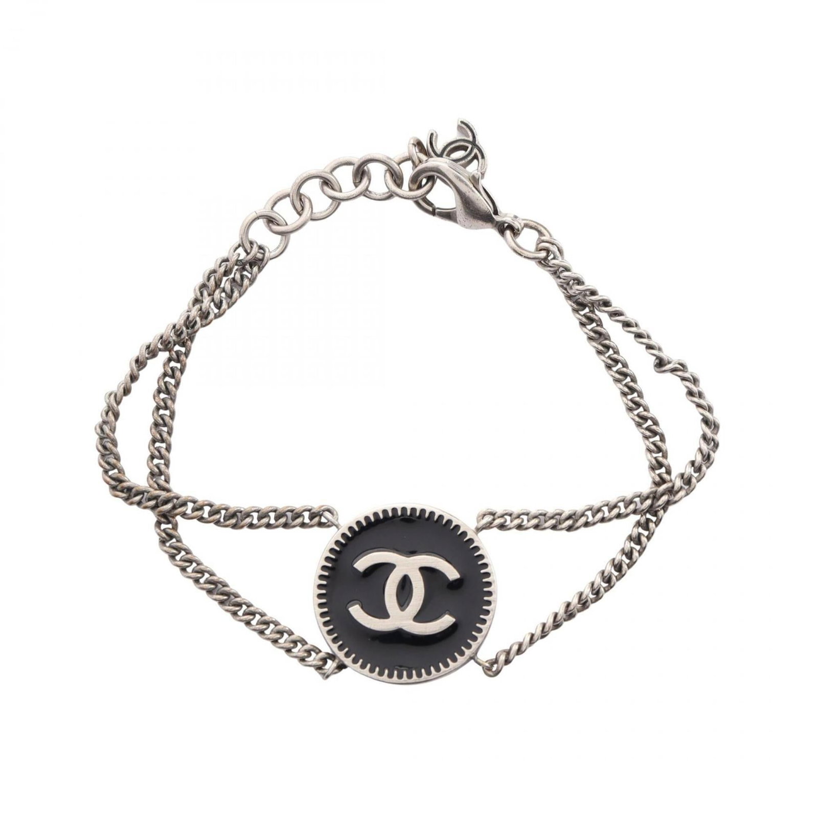 CHANEL Charm Bracelet Stainless Steel: CHANEL Charm Bracelet Stainless Steel Stainless steel charm bracelet from CHANEL, featuring a sleek black design with a silver finish. The 18.5cm length offers a versatile fit, while minor signs of