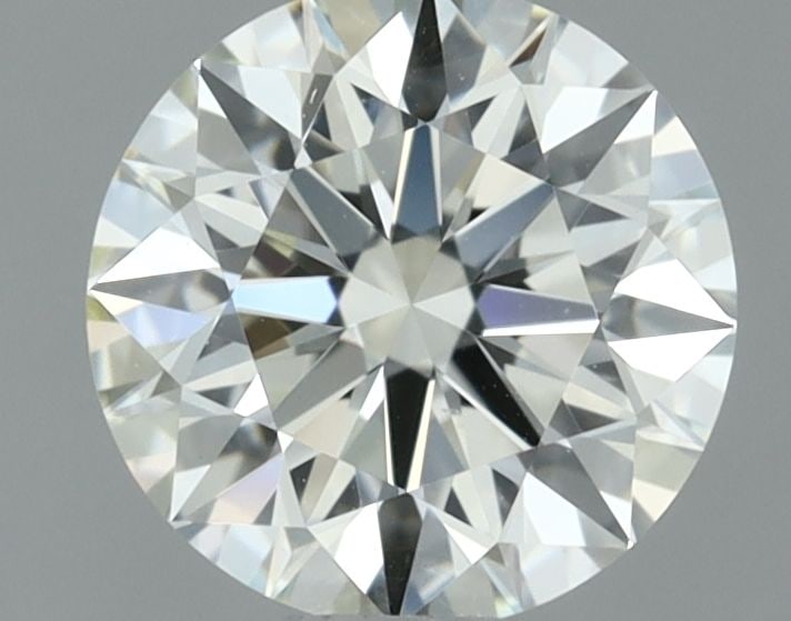 IGI Round 0.6ct J VVS2 - Loose Natural Diamond: IGI Round 0.6ct J VVS2 - Loose Natural Diamond 0.6ct IGI Round J VVS2 Diamond: A Natural BeautyThis loose, round diamond boasts exceptional clarity and color, with a VVS2 grade indicating minimal