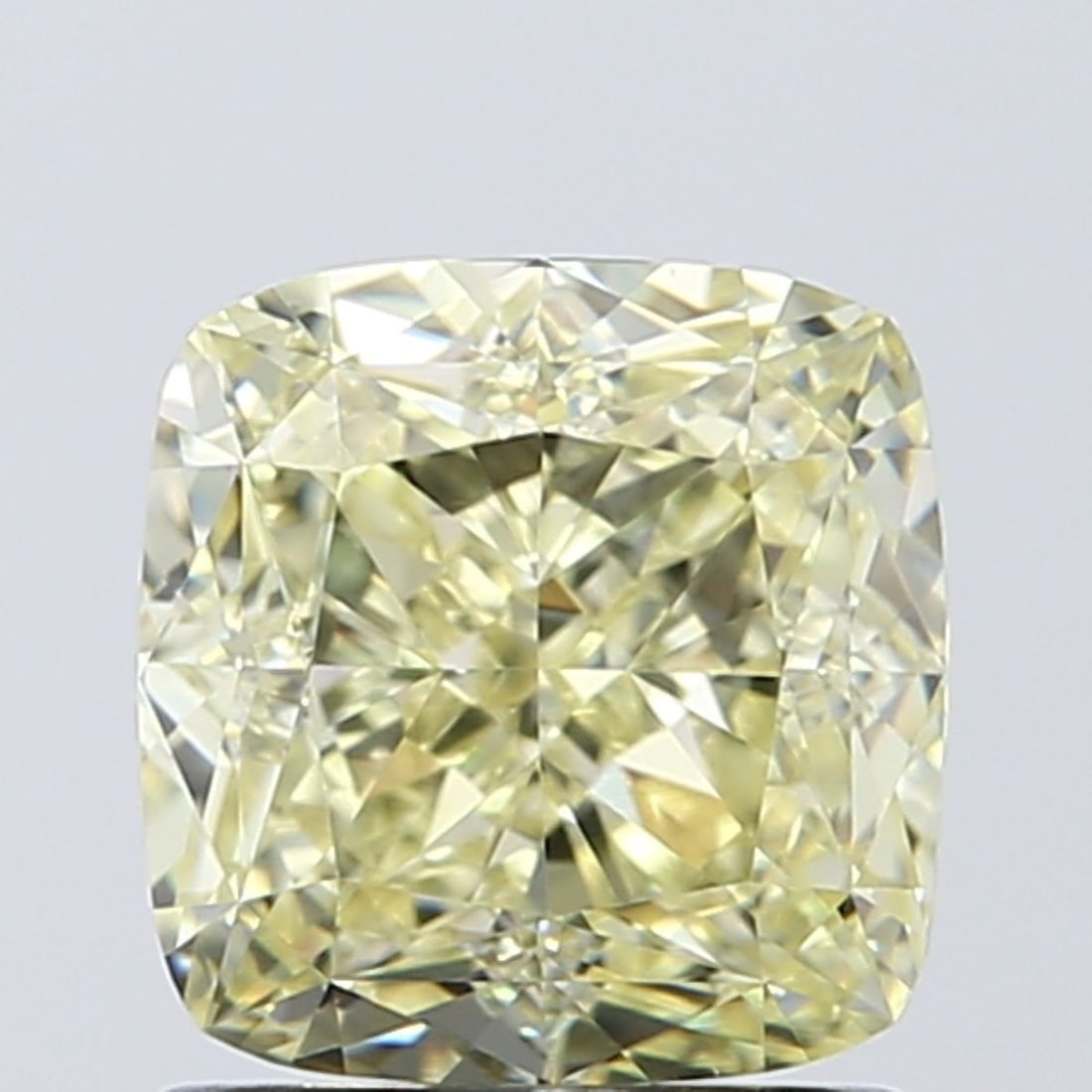 GIA Cushion Brilliant 1.41ct Yellow VVS2 - Loose Natural Diamond: GIA Cushion Brilliant 1.41ct Yellow VVS2 - Loose Natural Diamond GIA certified, this 1.41ct yellow diamond boasts exceptional clarity with a VVS2 grade, and its EX polish and VG symmetry make it a