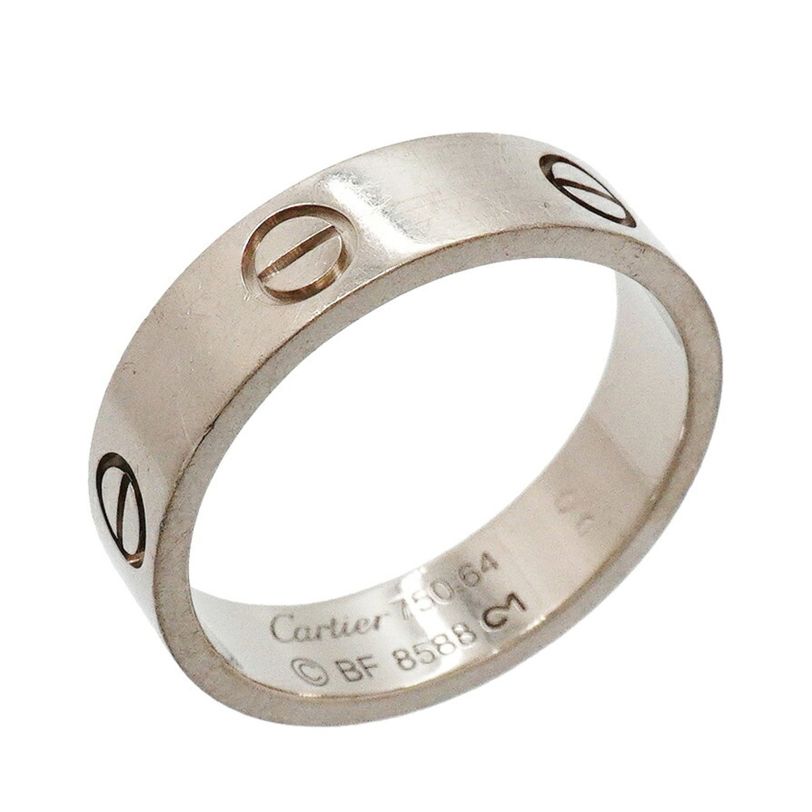 CARTIER Band Ring White Gold (18K): CARTIER Band Ring White Gold (18K) Cartier Band Ring White Gold (18K) is a pre-owned, 64 US size, 11.5 band ring featuring 18K white gold. The ring bears visible signs of wear, including scratches and